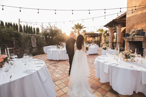 Reception terrace lit at dusk before guests arrive