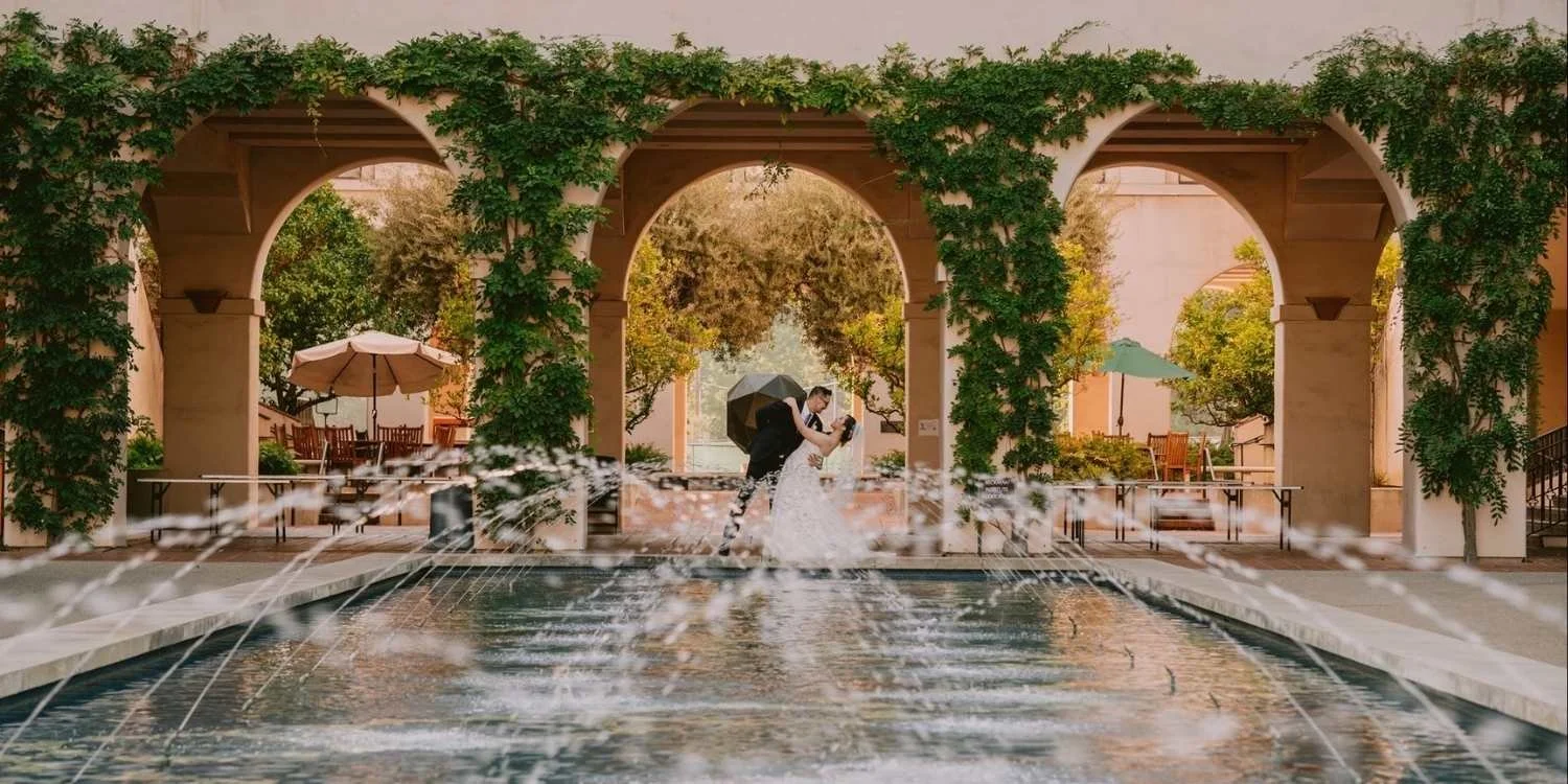 Engagement session under the vine-covered arcades and reflecting pool at Caltech in Pasadena
