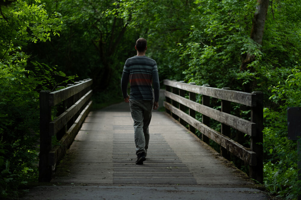 Noble_Woods_Park_Bridge_Man_Walking.jpg