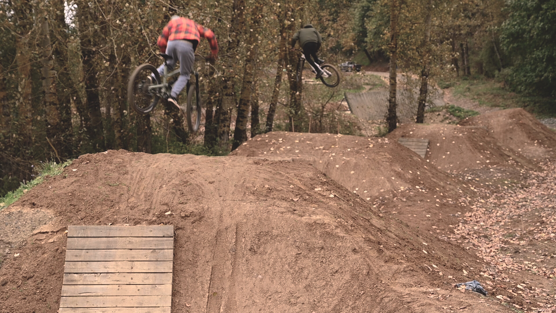 Riders jump in synchronicity at the skills park 