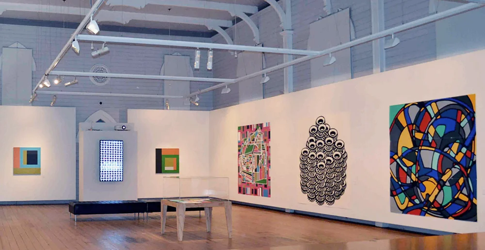  Instal photo, Wesley wing. From far left:  Arp , (digital display lightbox),  Moog, Sequential Circuits, Inset, Collider II  