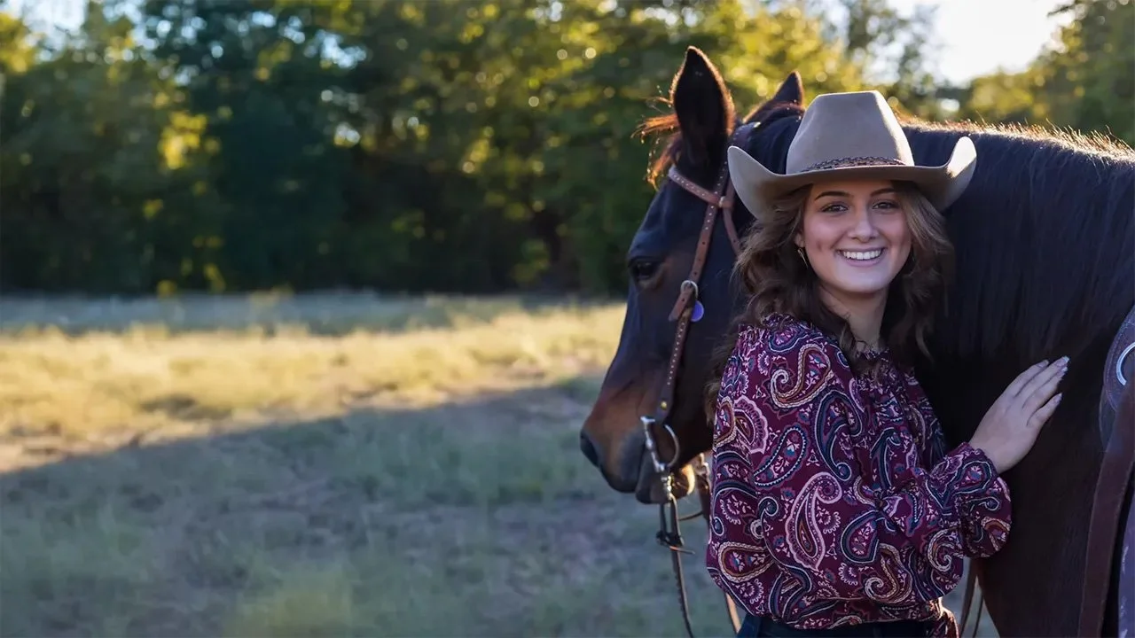 young-cowgirl-with-horse.jpg