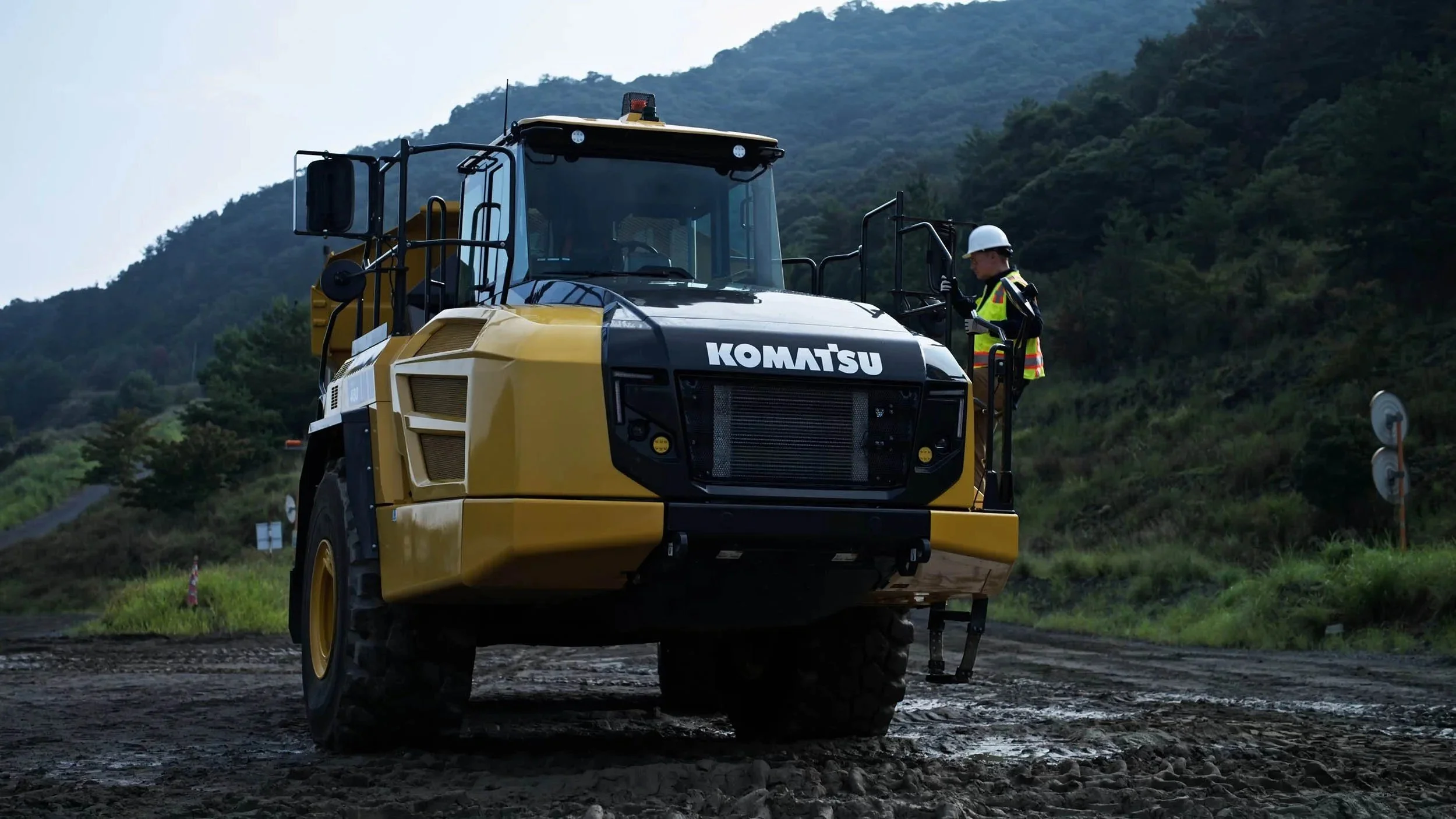 Komatsu HM460 dump truck at its test site in Oita, corporate film and photography production in Japan
