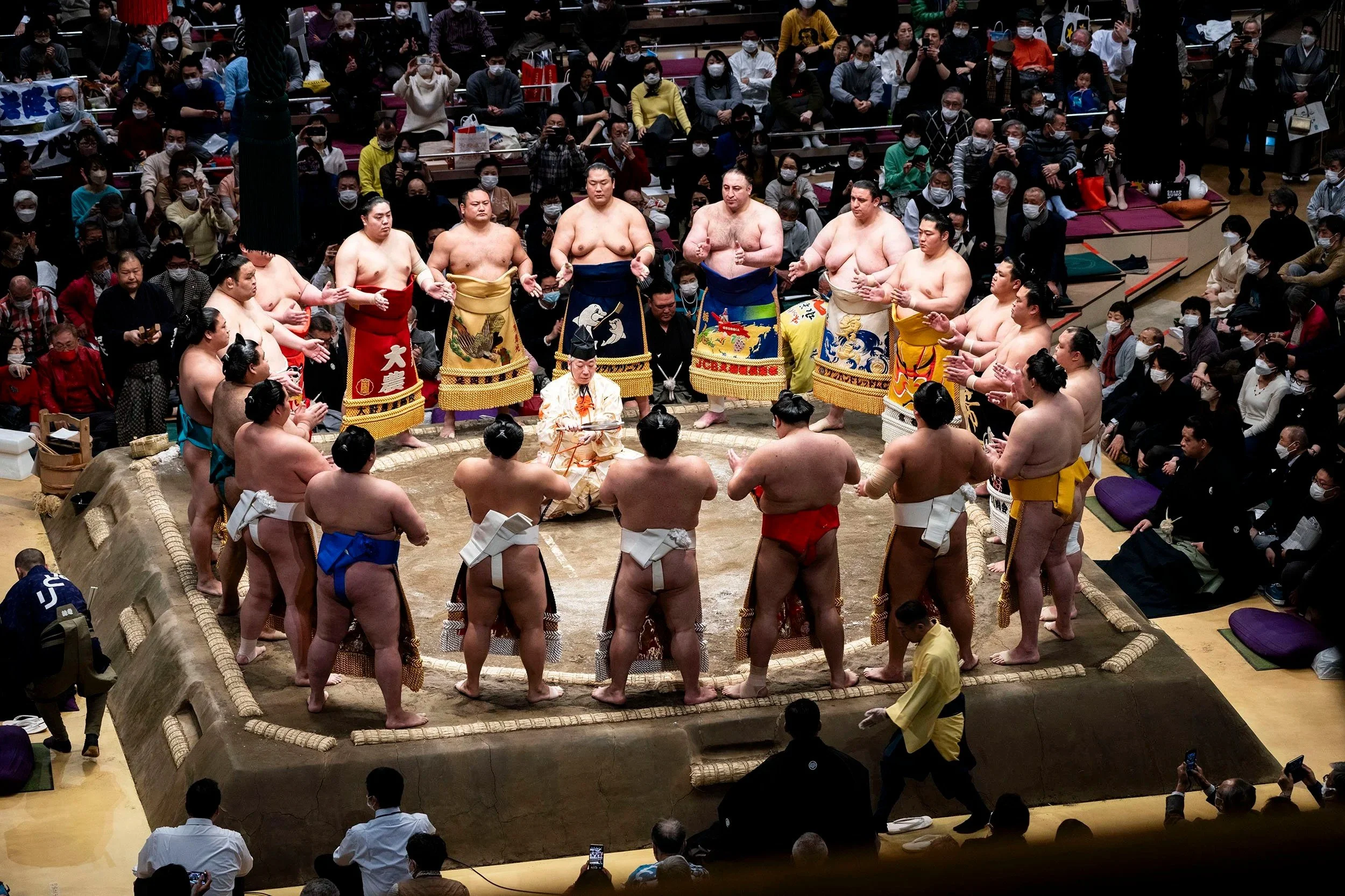 Sumo wrestlers at morning practice in a sumo stable in Japan, editorial photography for Qantas magazine
