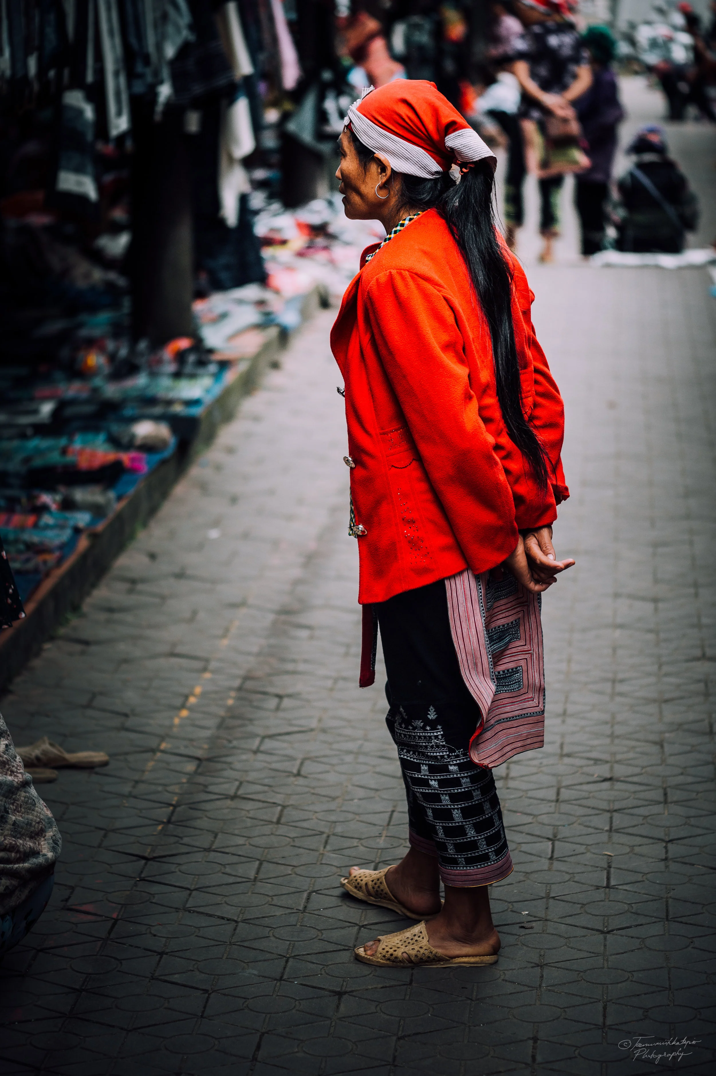 A Red Dao woman in the market place in Sapa town.