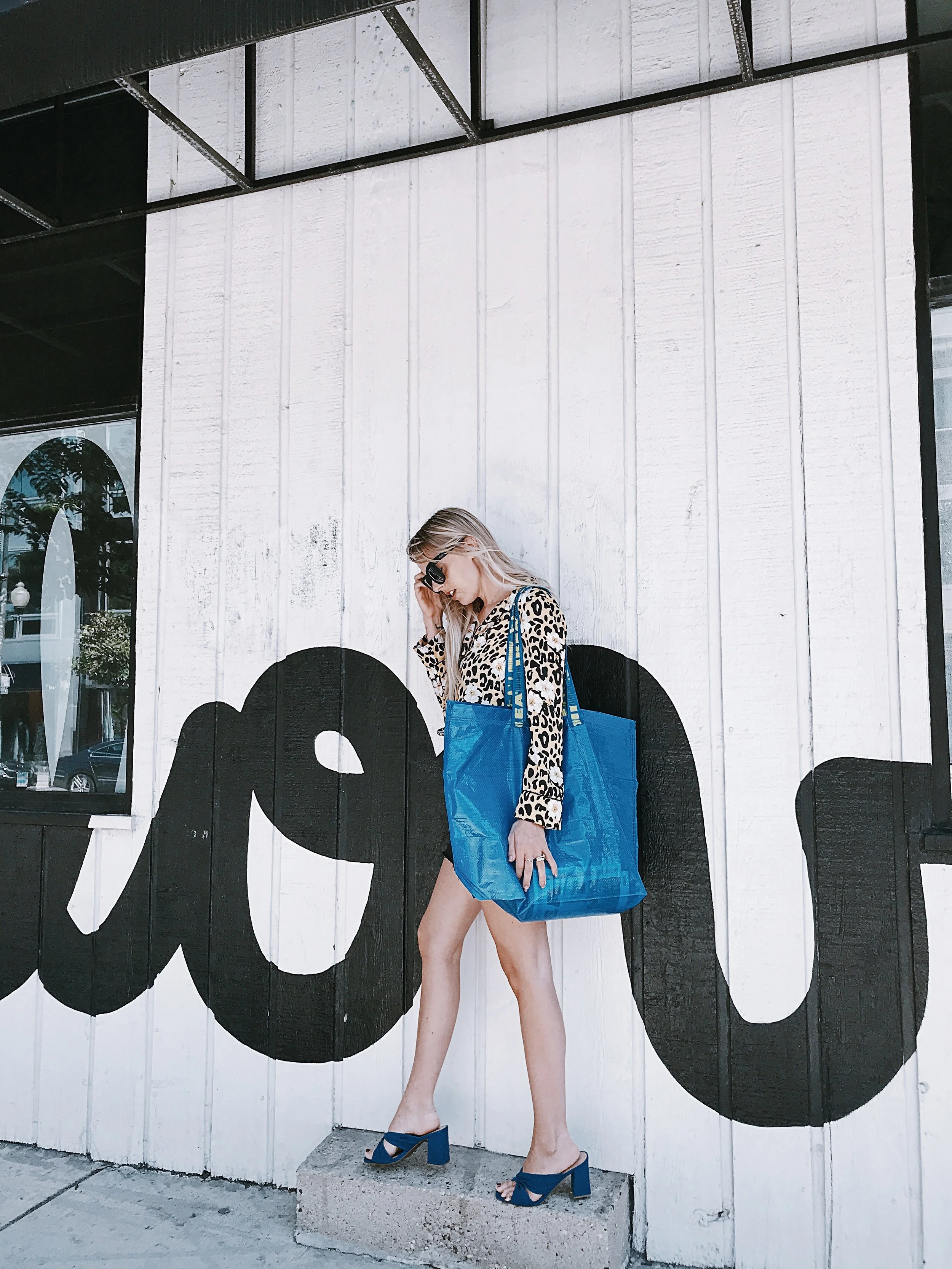Top: Topshop (Nordstrom, sold out), Skirt: Topshop , Shoes: Target , Bag: Ikea, Sunglasses: Quay (see similar here) . Click on image above to shop similar styles from Topshop.