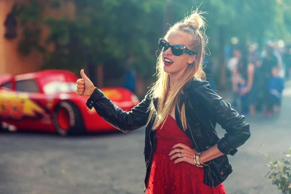 Lightening McQueen Outfit Details: Dress ( Unique Vintage ), Vegan Leather Jacket ( h&m ), Star Heels ( Amazon ), Sunnies ( Versace )