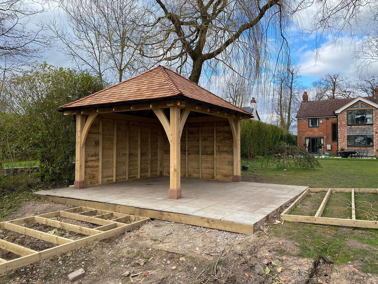 Oak pergola with oak cladding and cedar shingle roof. Looking great, fabulous space ready for Spring!