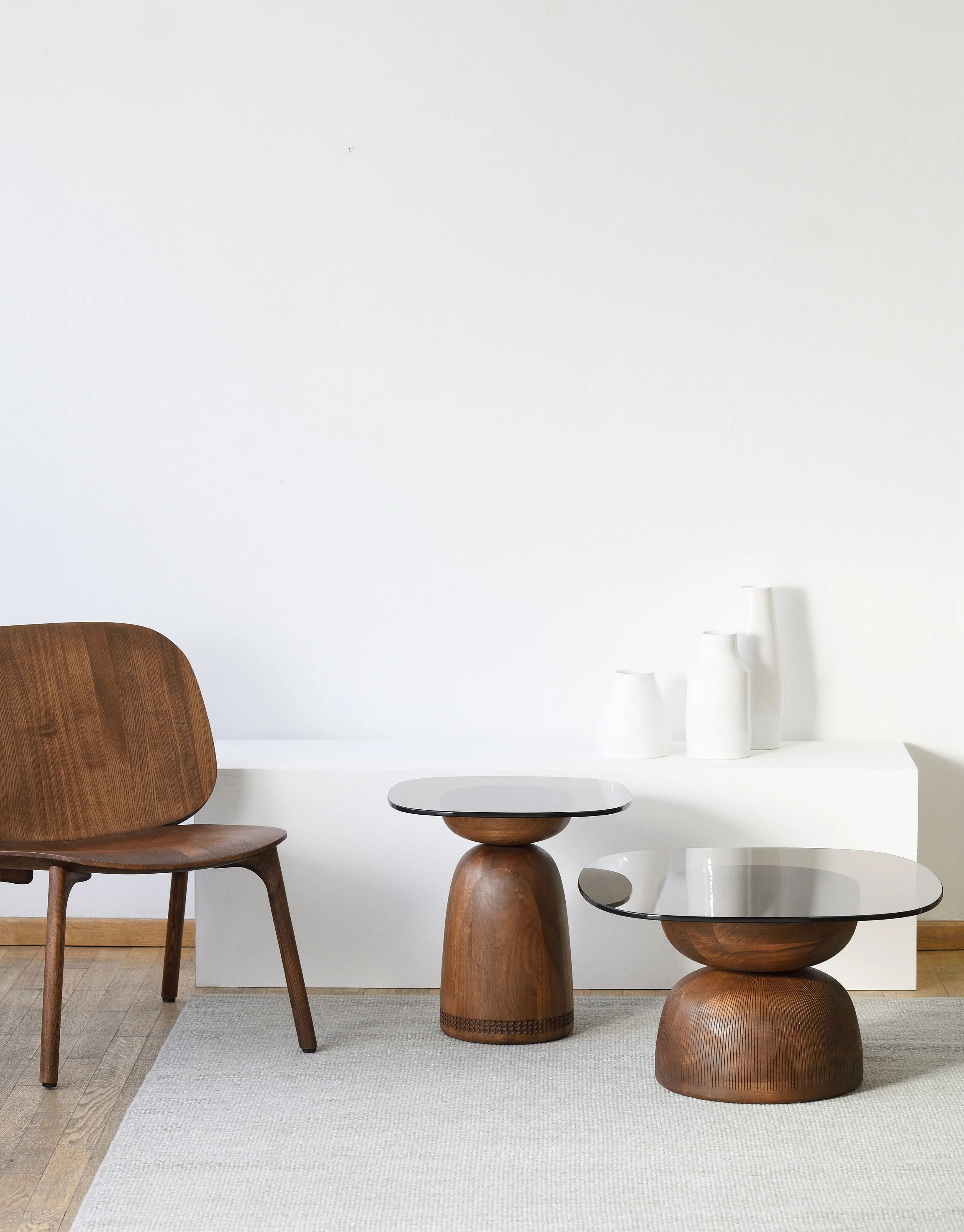 Nera coffee and side table by Monica Förster for Zanat, hand-carved solid wood base with colored glass top