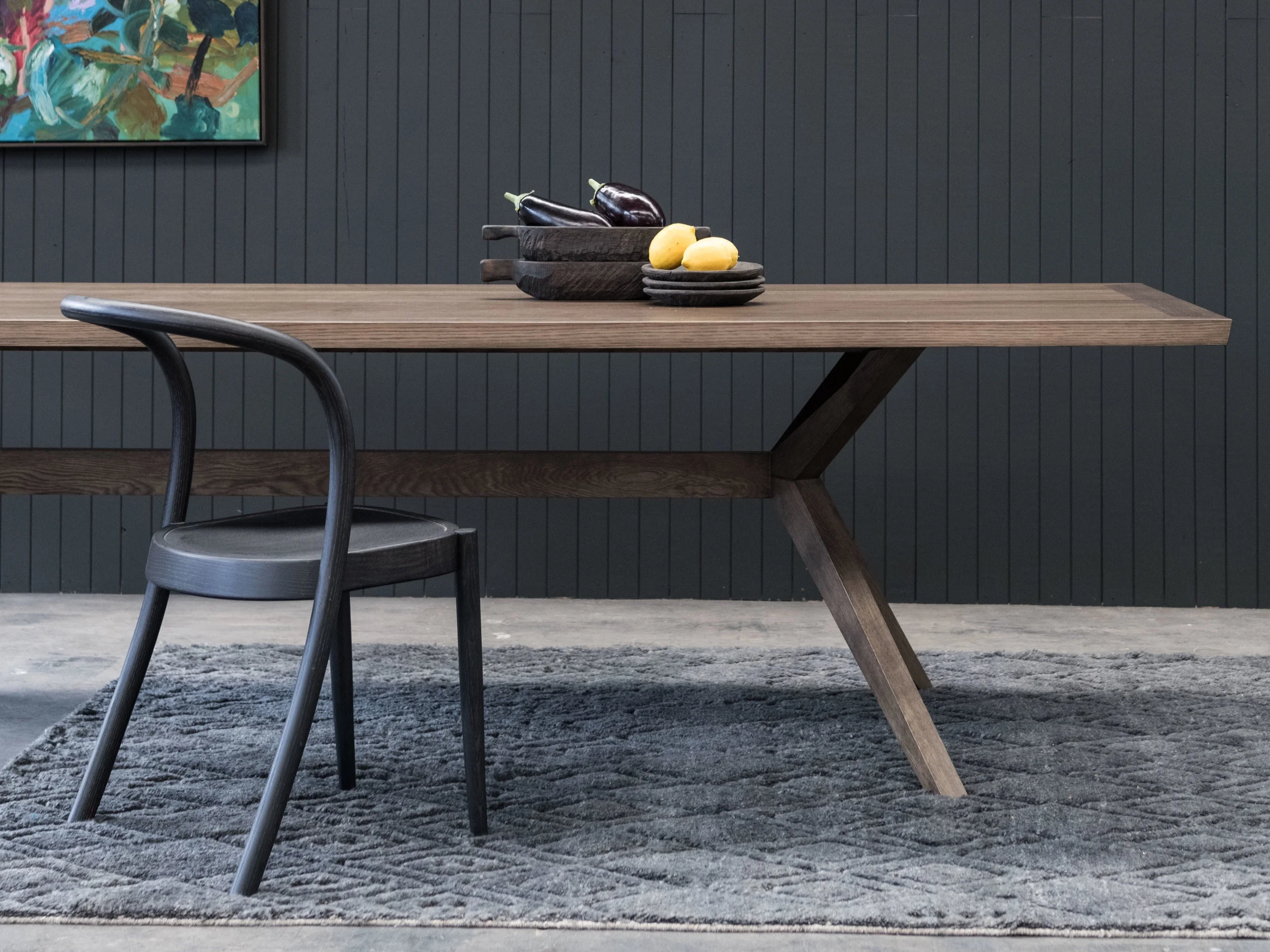 Oak, teak oiled oak with seat upholstered & black with black leather