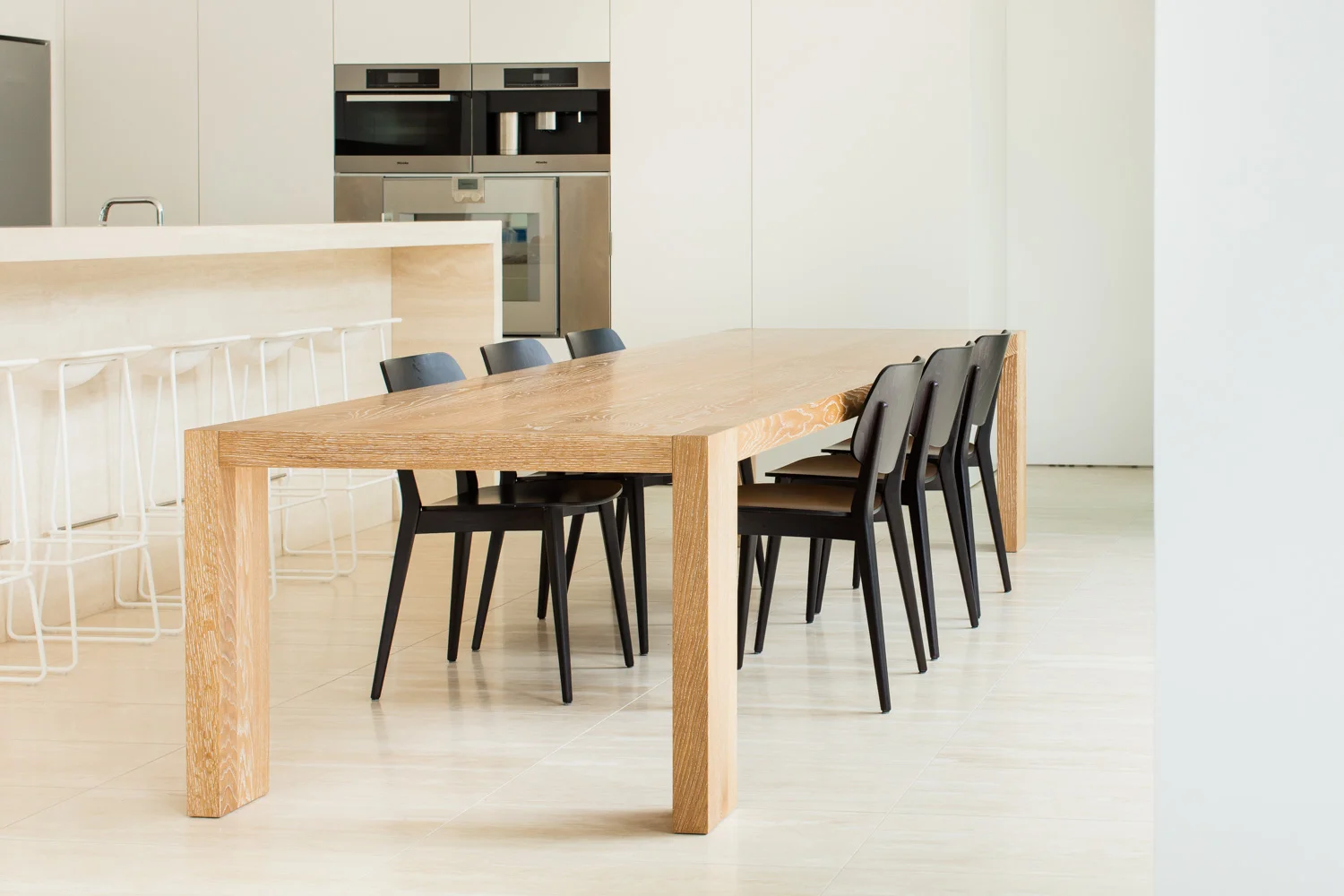 Oak, teak oiled oak with seat upholstered & black with black leather