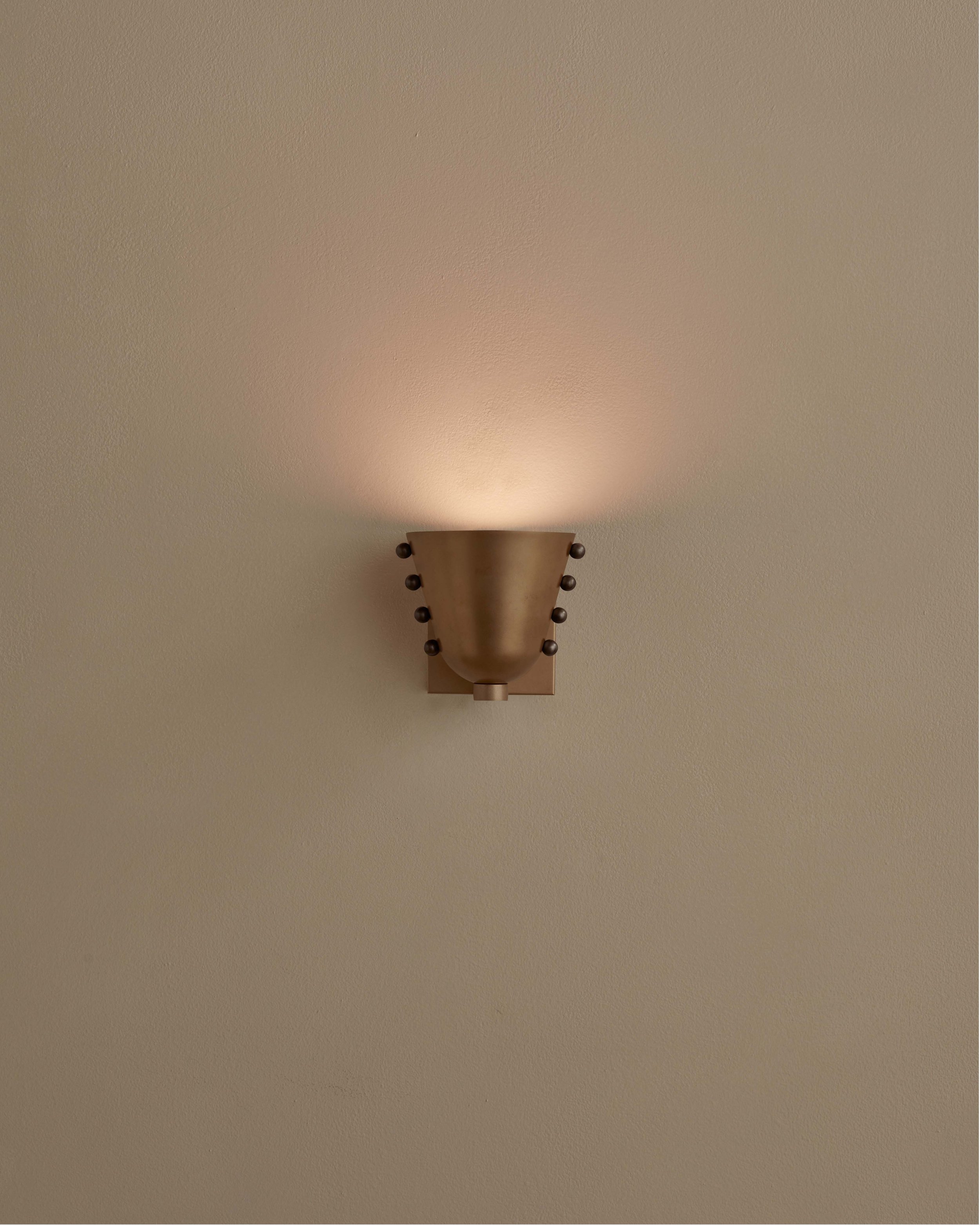 INCOMMONWITH_SCONCE_CALLA_WALL_SCONCE_FACING_UP_BRASS_PEWETER_DOTS_ON.jpg