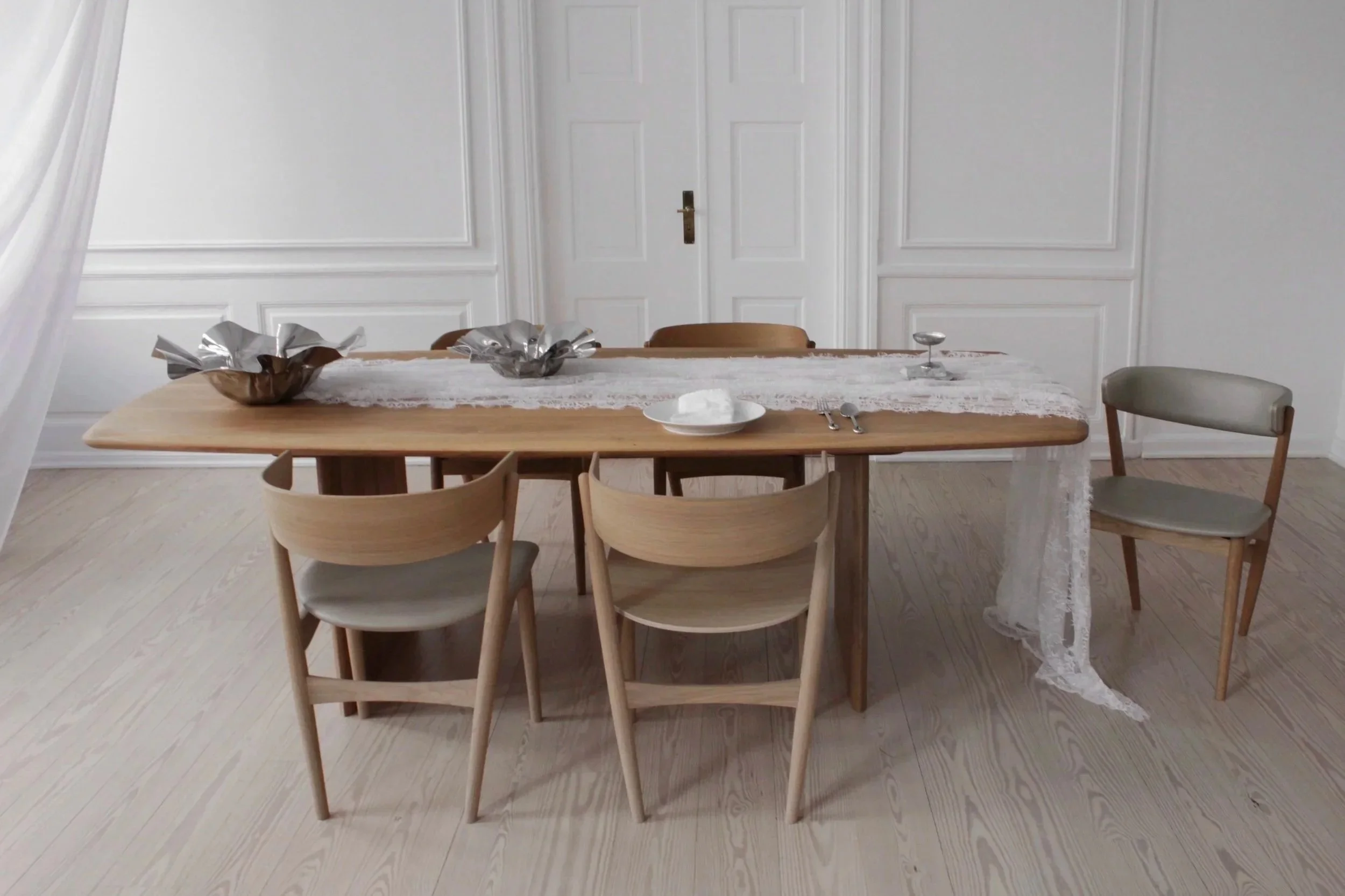 The Sibast No. 7 Chair is also available in both fully upholstered and seat-upholstered editions.