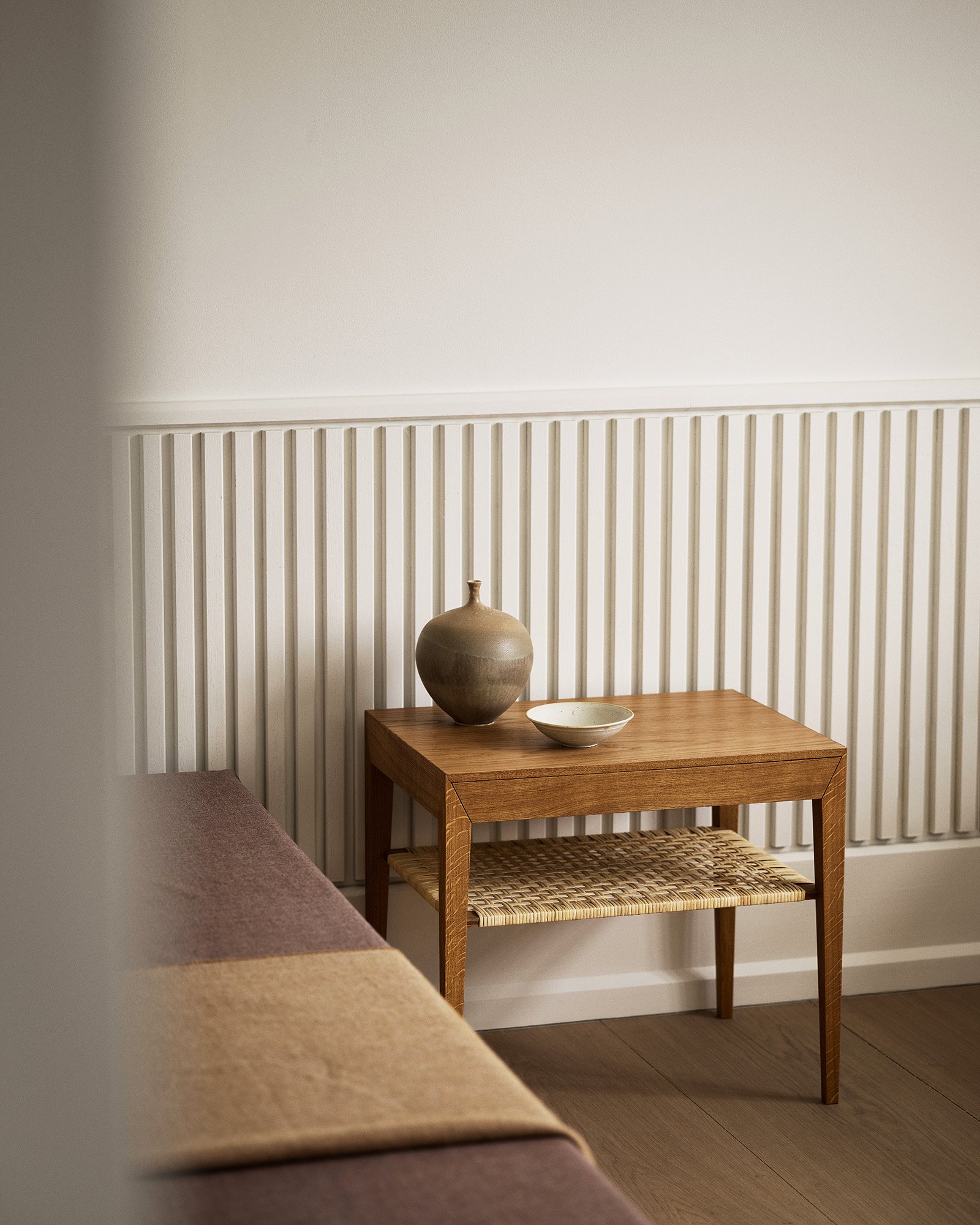 Severin Hansen's Model 35 bedside table by Dagmar in solid wood with single drawer and tapered legs, designed in 1958 as part of the classic Danish Modern collection
