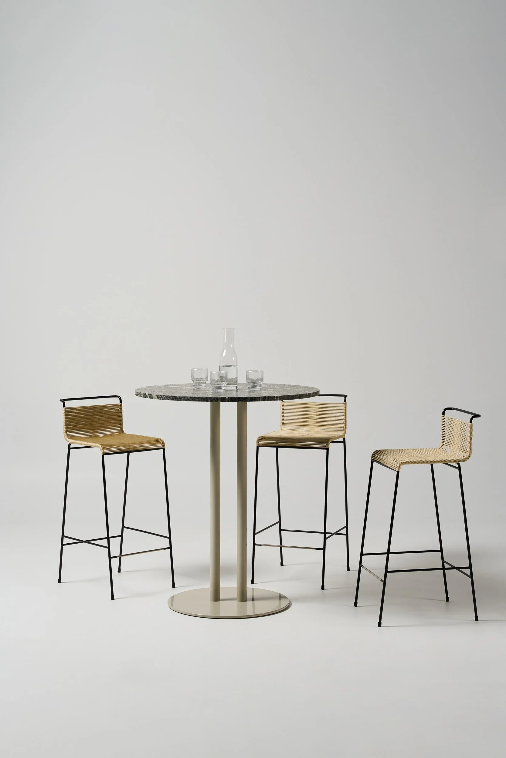 Meadmore-Corded-Stool-1952-wBack-Straw-Table-1.jpg