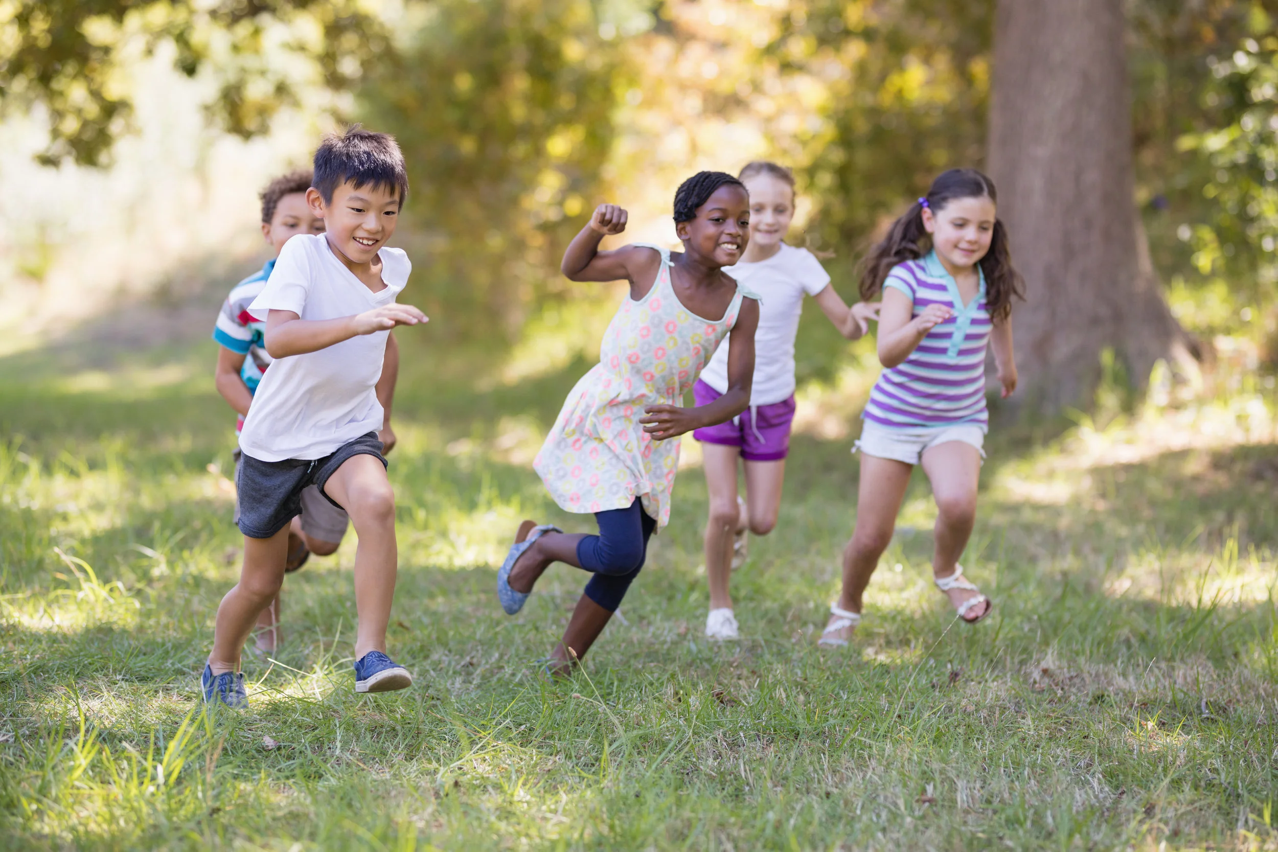 playful-children-running-at-campsite-3J7VEX9.jpg