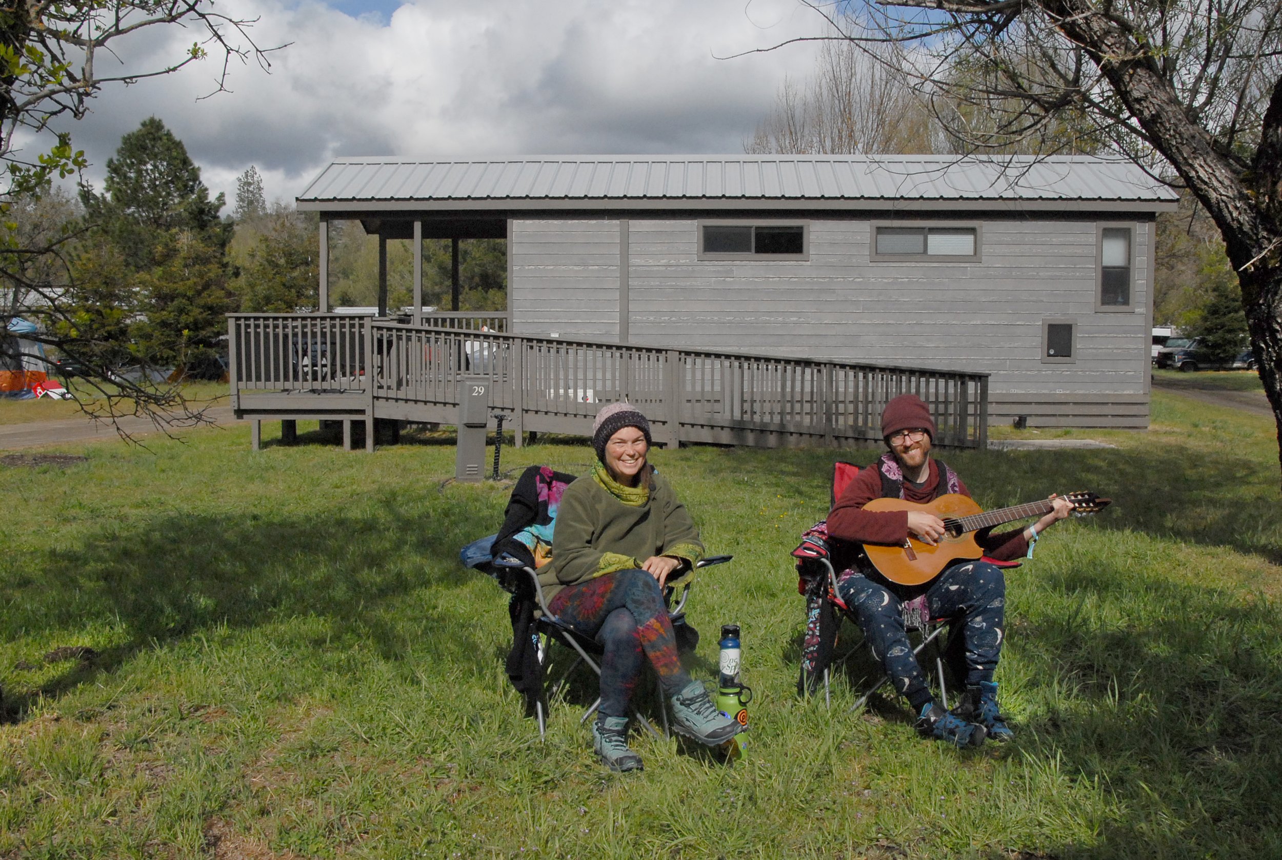 Guitar playing by cabin.jpg