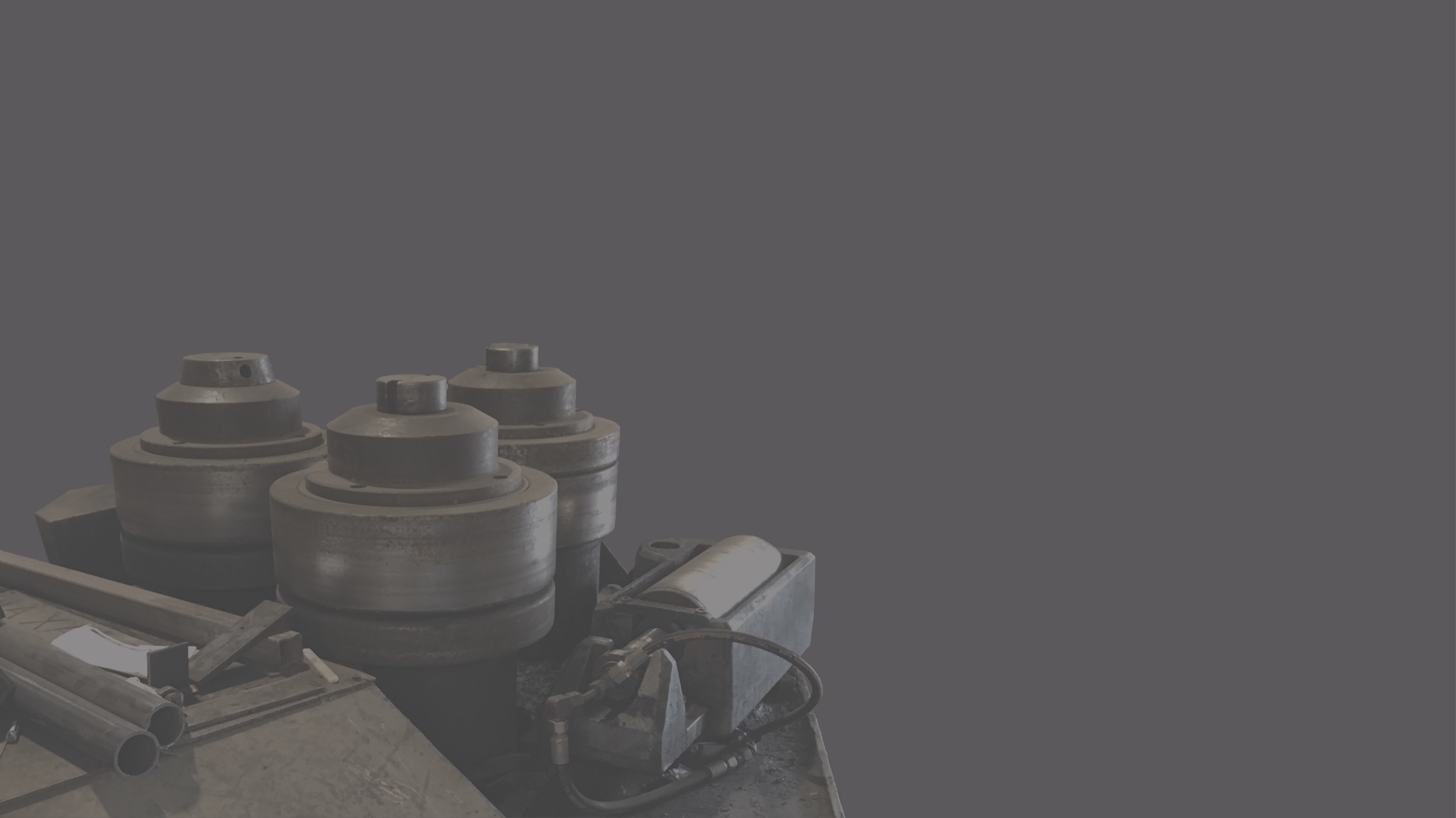 Angle Iron Ring Roller on Grey Background.png