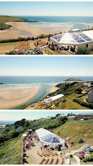 Drone videography of a large white marquee on a beach in Devon for a festival themed wedding