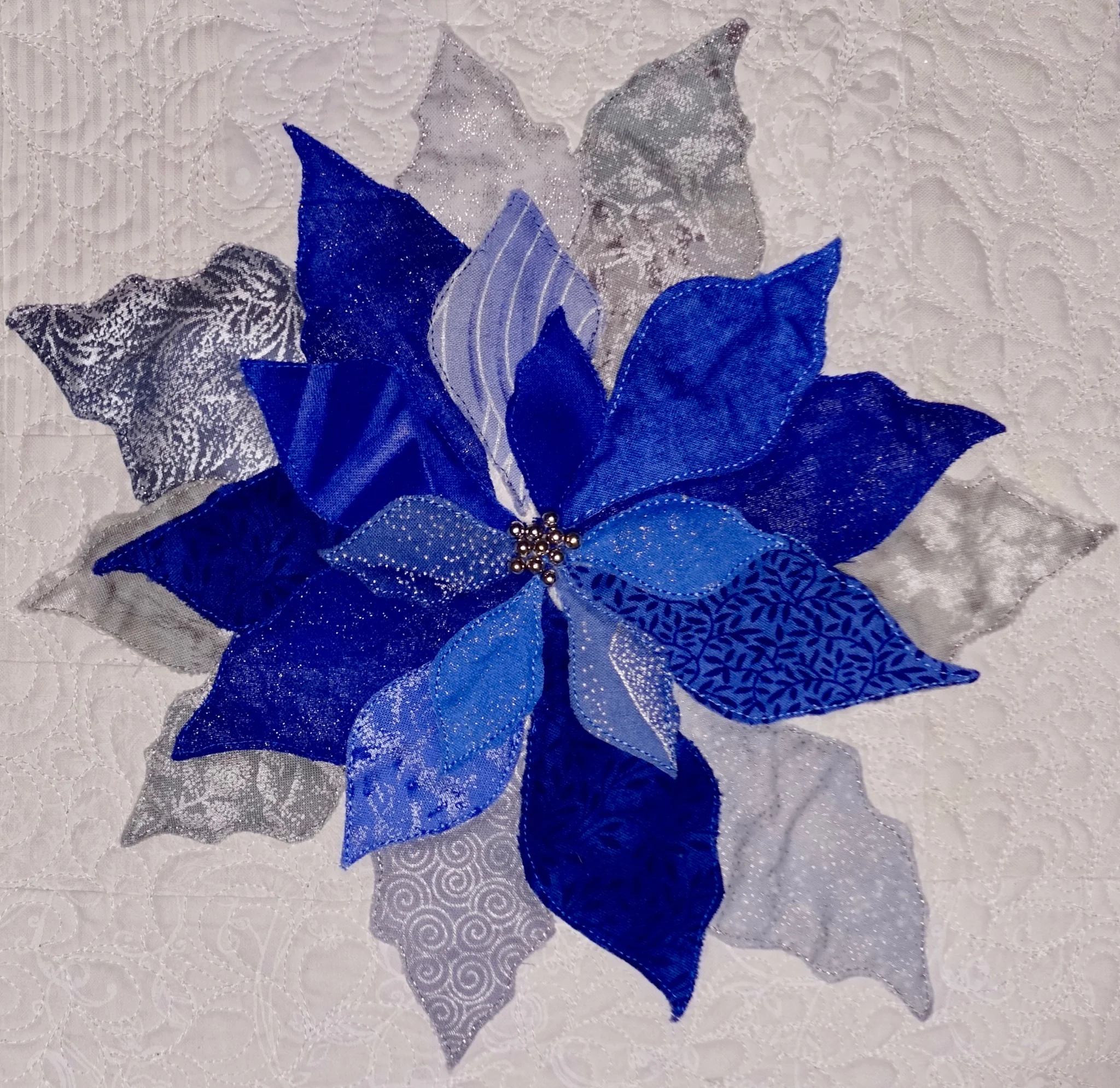 Blue and Silver Tree Skirt, Detail of Poinsettia