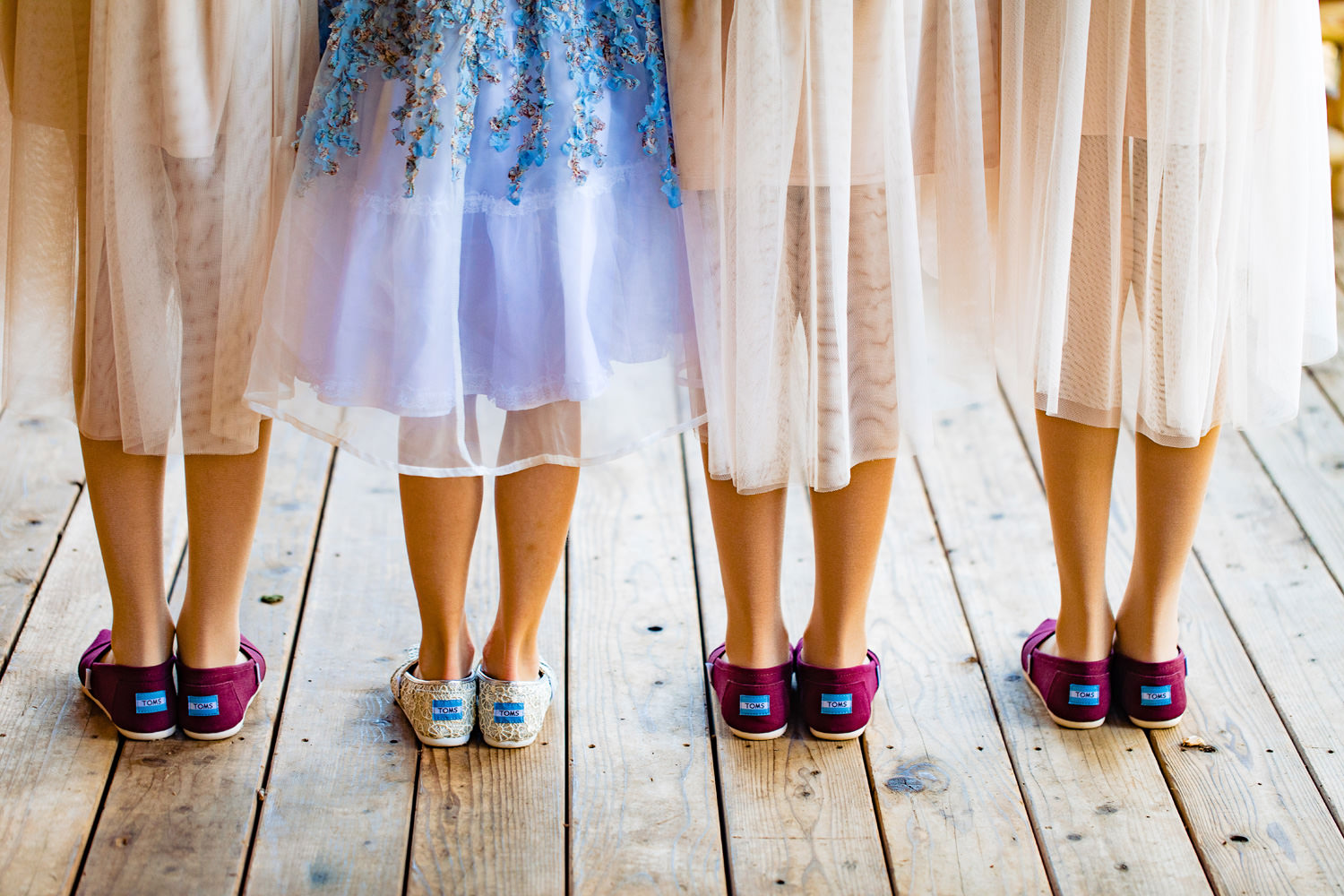 bridesmaids shoes ready for duty as captured by wild basin wedding photographer tomKphoto in allenspark, colorado