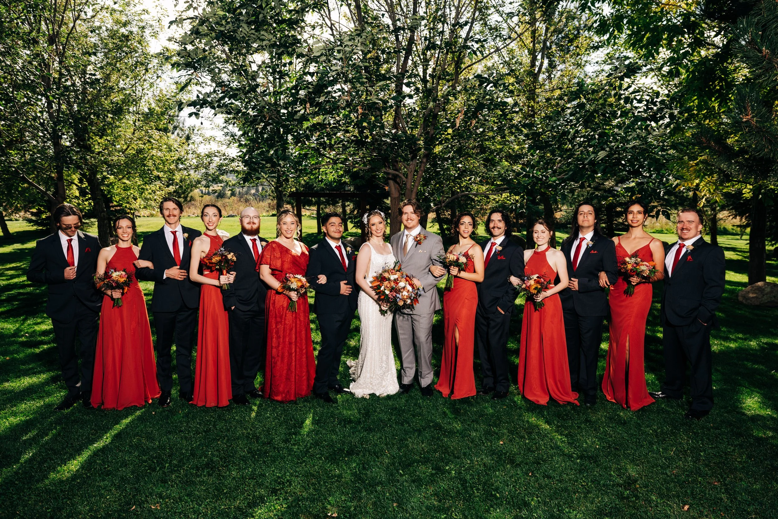 A full wedding party formal portrait during a Summer Greenbriar Inn wedding in Boulder, Colorado