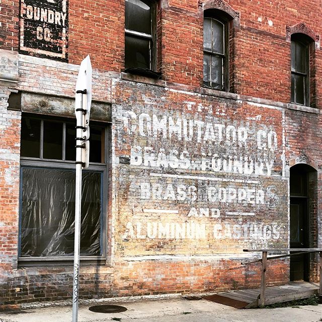 Faded painted signs on old brick buildings get me every time.