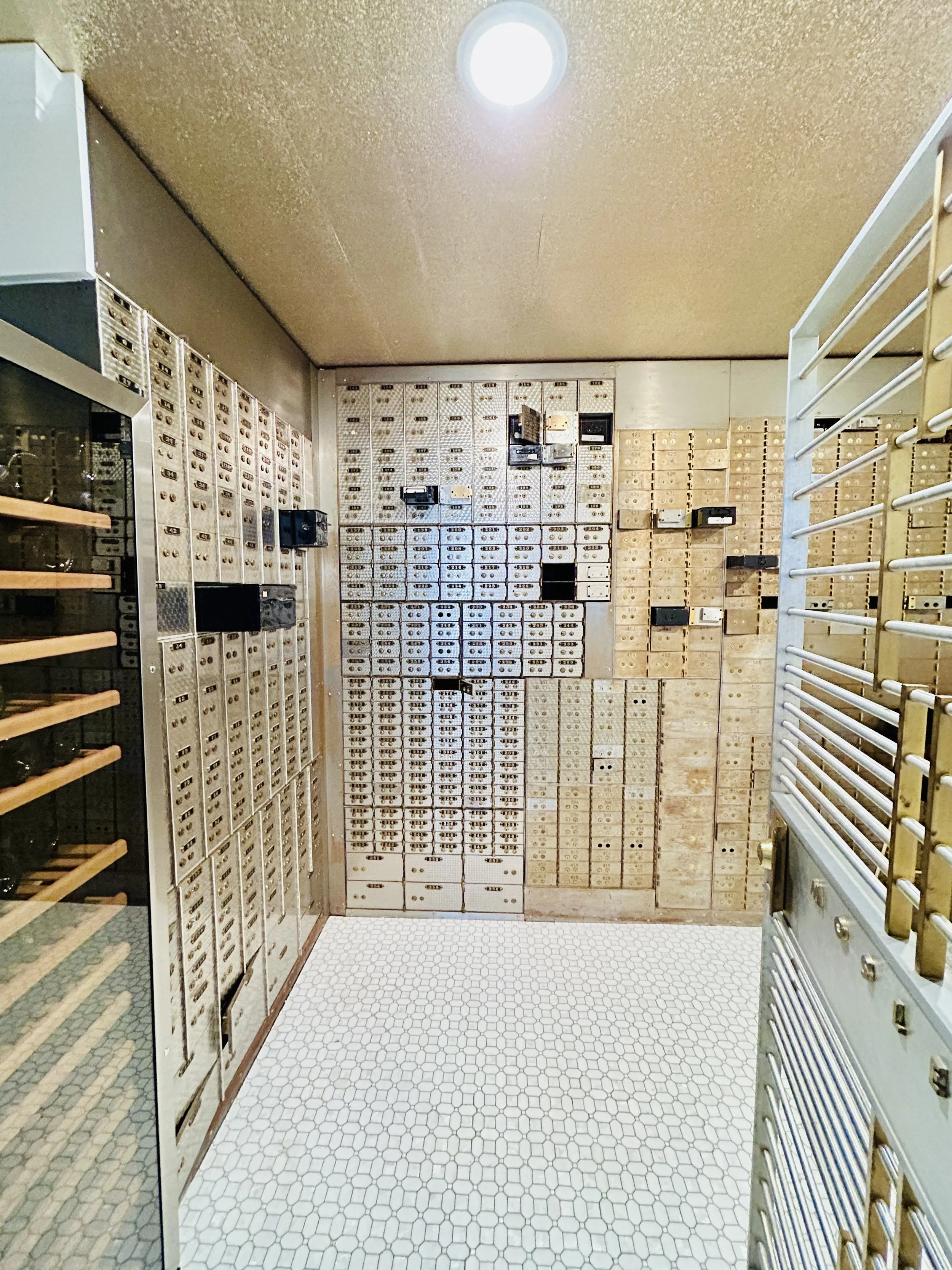 Historic bank vault with original safety deposit boxes inside The Treasury wedding venue in Delavan Wisconsin.