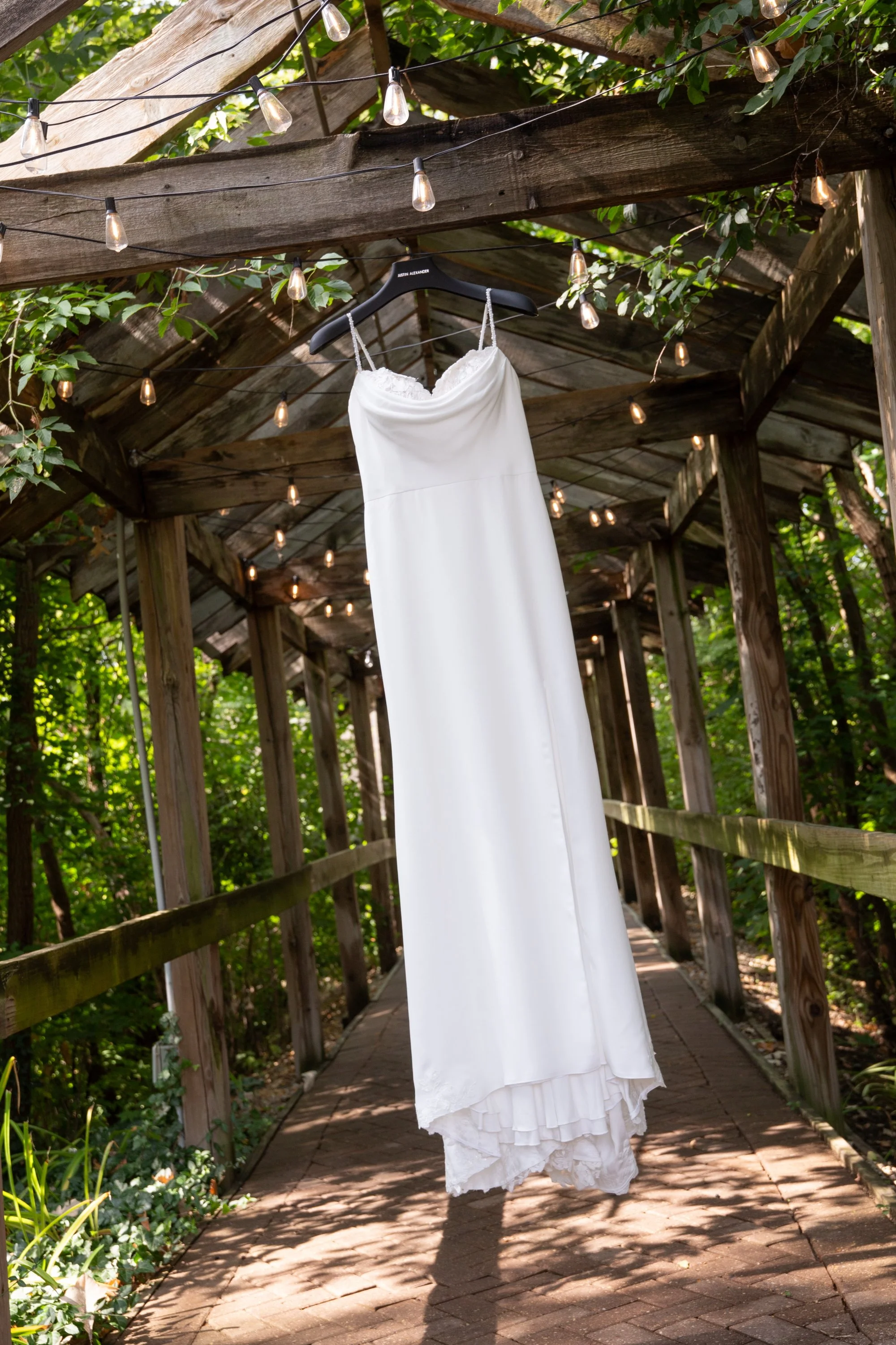 The covered bridge at Shores of Turtle Creek in Spring Grove, IL is a perfect photo opportunity for the wedding dress.