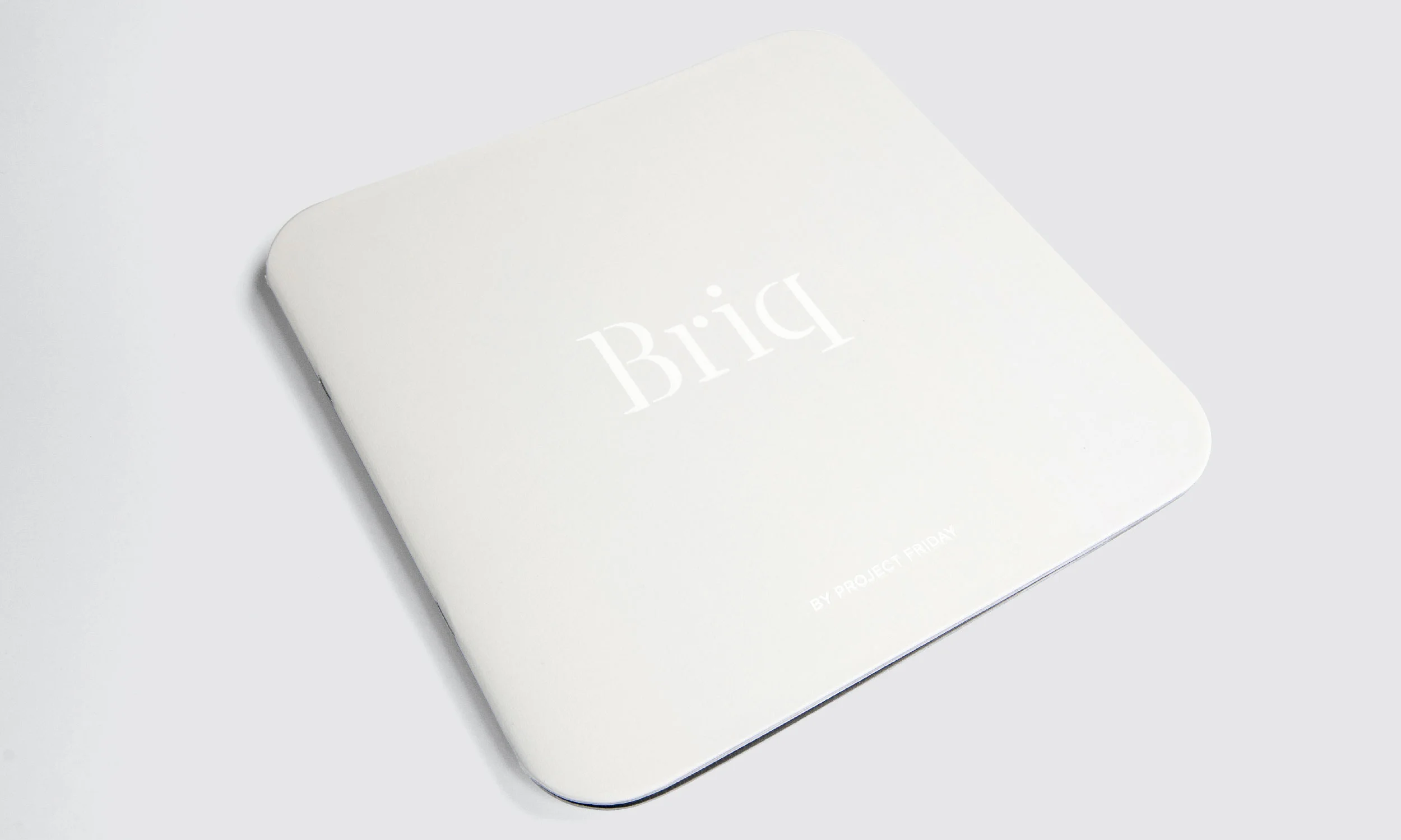 The branding complements the timeless forms and signature curves of the architecture.