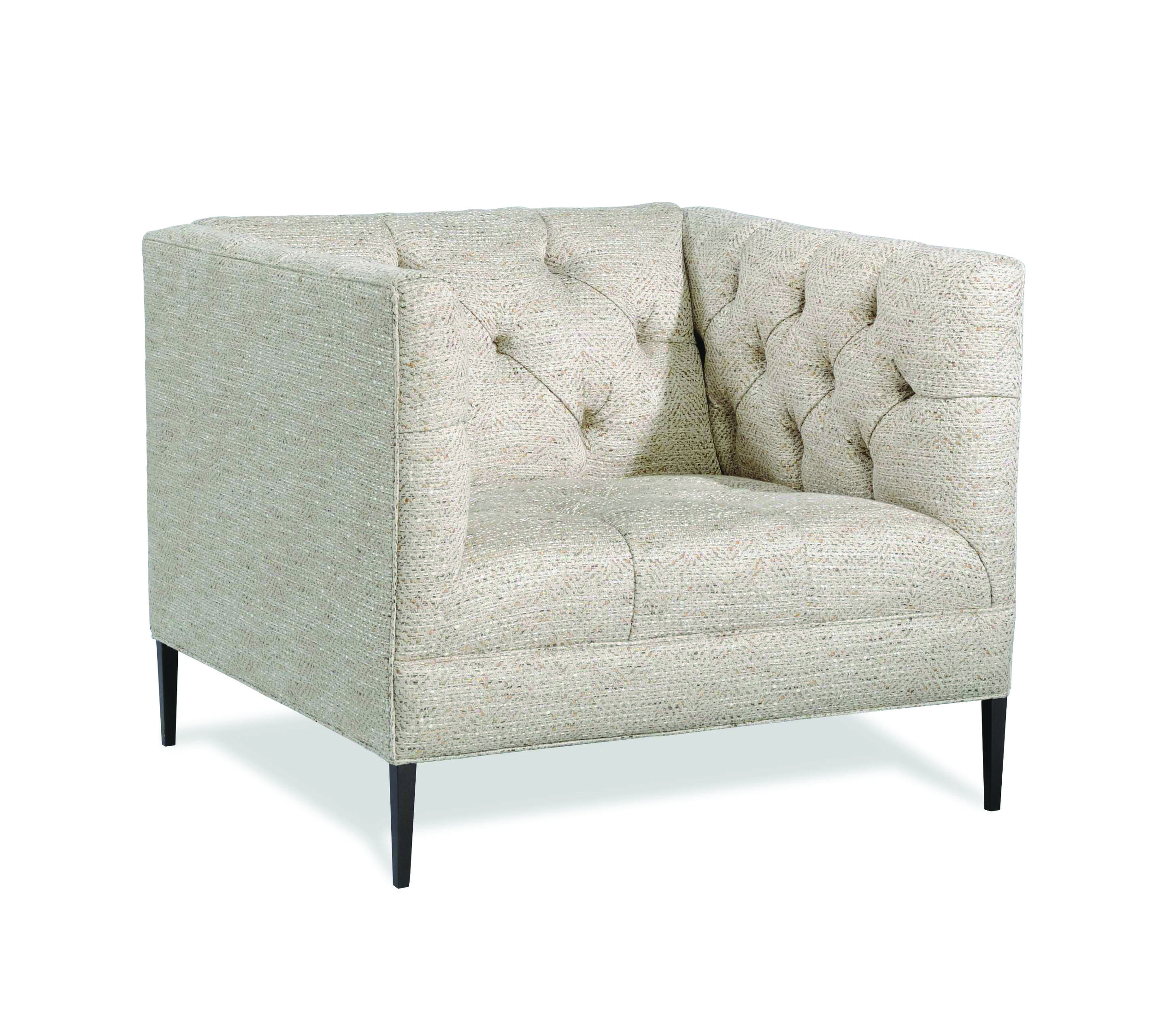  The warmer grey tone of this tufted Mid-century modern chair pairs well with the dark wood legs and is an example of how a warmer grey works perfectly with wood. 