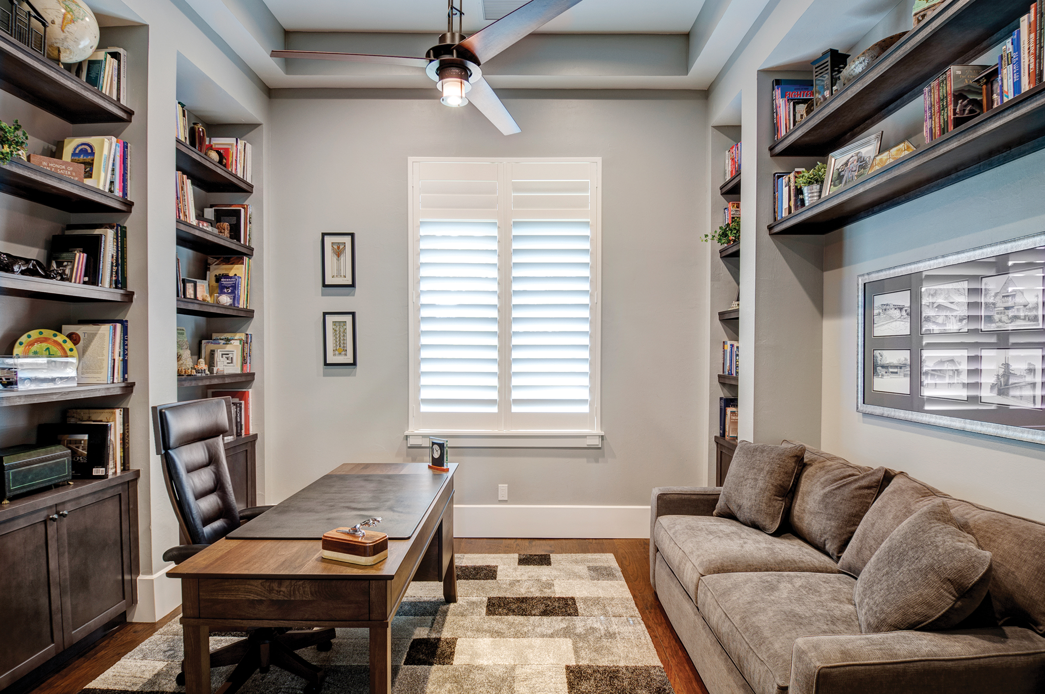  The home office features the other Amish-made pieces. The desk and chair are both handmade in Sarasota—a testament to the fact that you don’t have to go very far to find unique, high-quality items for you home. Simple and elegant dark wood built-ins