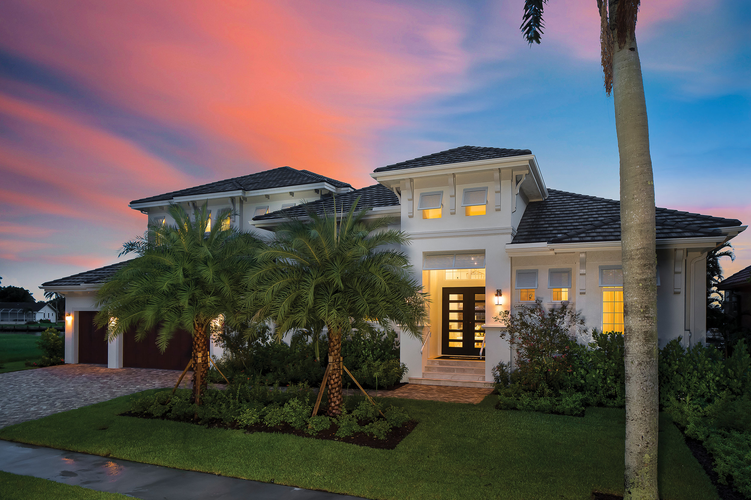  The home’s inviting exterior, created by Southwest Florida Design, is a beautiful blend of West Indies style and classic Florida charm. The home is balanced but not symmetrical, creating a more casual appeal perfect for its island location. Accents 