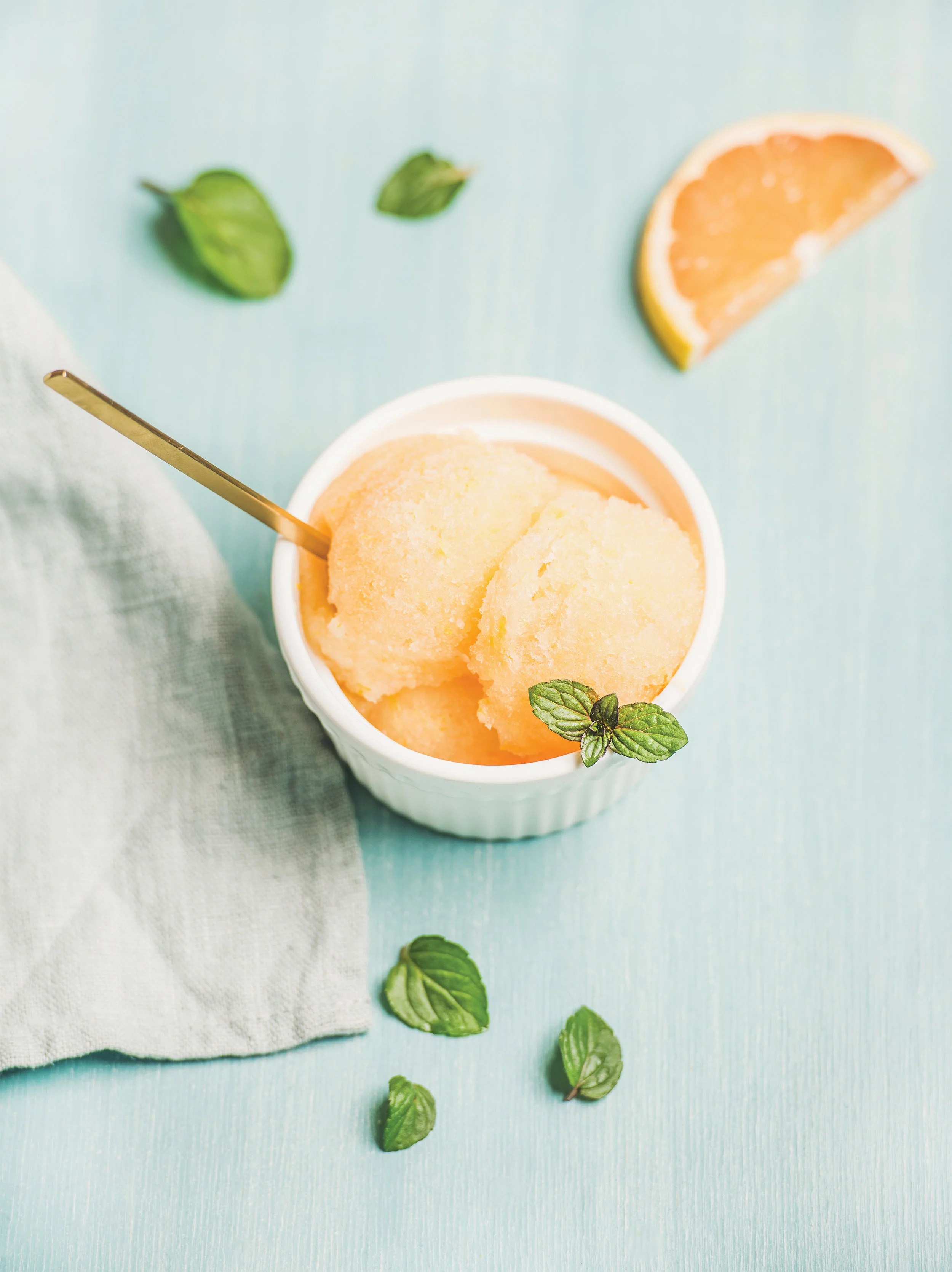 pink-grapefruit-sorbet-with-fresh-mint-leaves-in-PJLNBNC.jpg