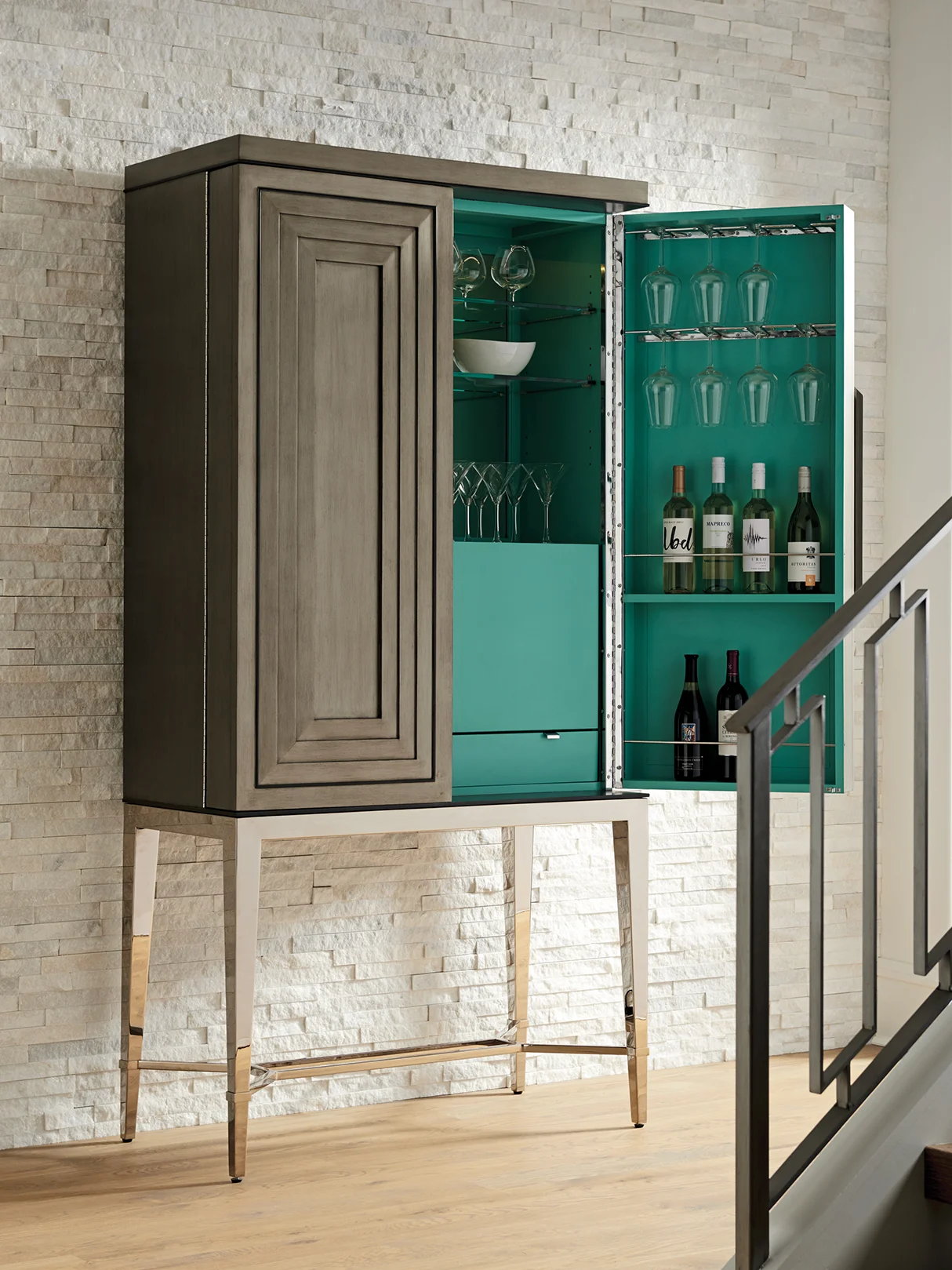 Make the most of your entertaining space by storing bar items in beautiful furniture-like pieces. When not in use, they enhance the look of your room and then open up to provide the perfect drink station when the party gets going.
