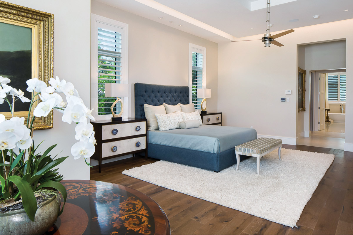  Warm wood floors are the base for the master retreat. The large suite is lit by LED lights in the floating ceiling details. The room is kept tranquil through the use of lighter colors accented by peaceful blue tones. The room also has a sitting area