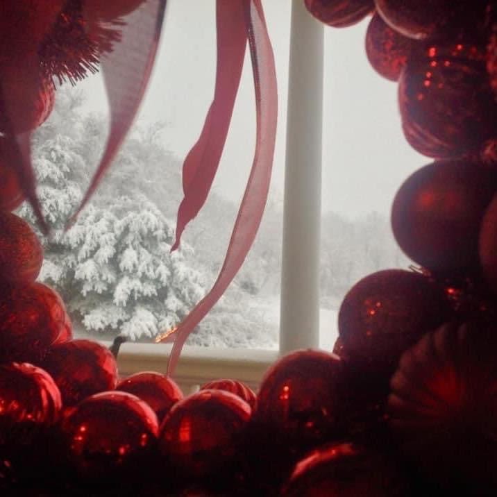 Winter weather through wreath.JPG