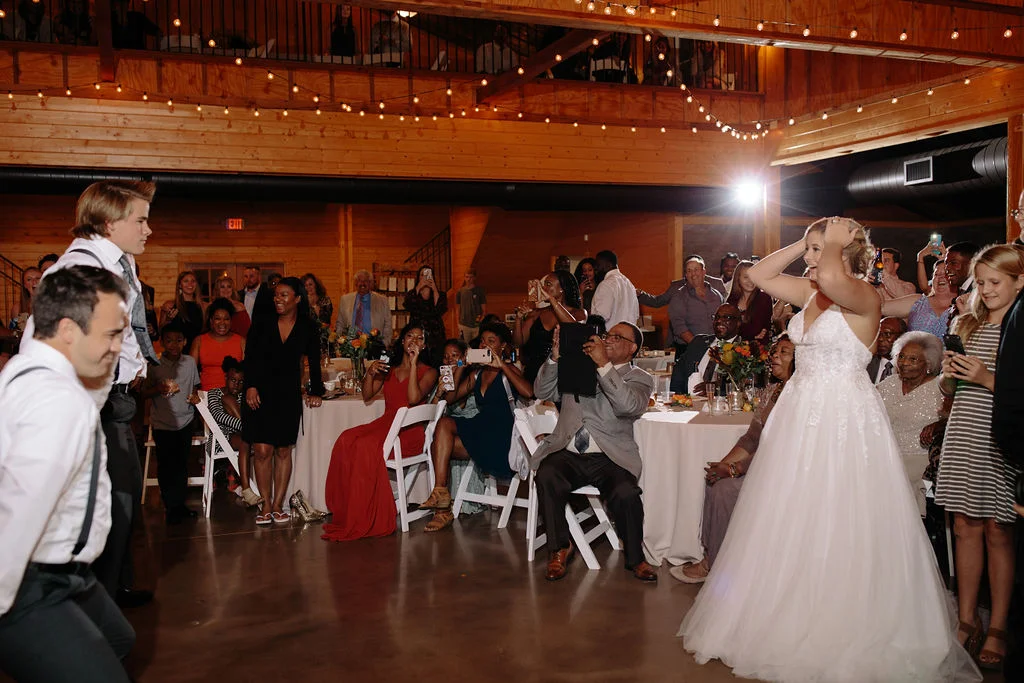 The bride’s reaction to her family surprising everyone with a dance!