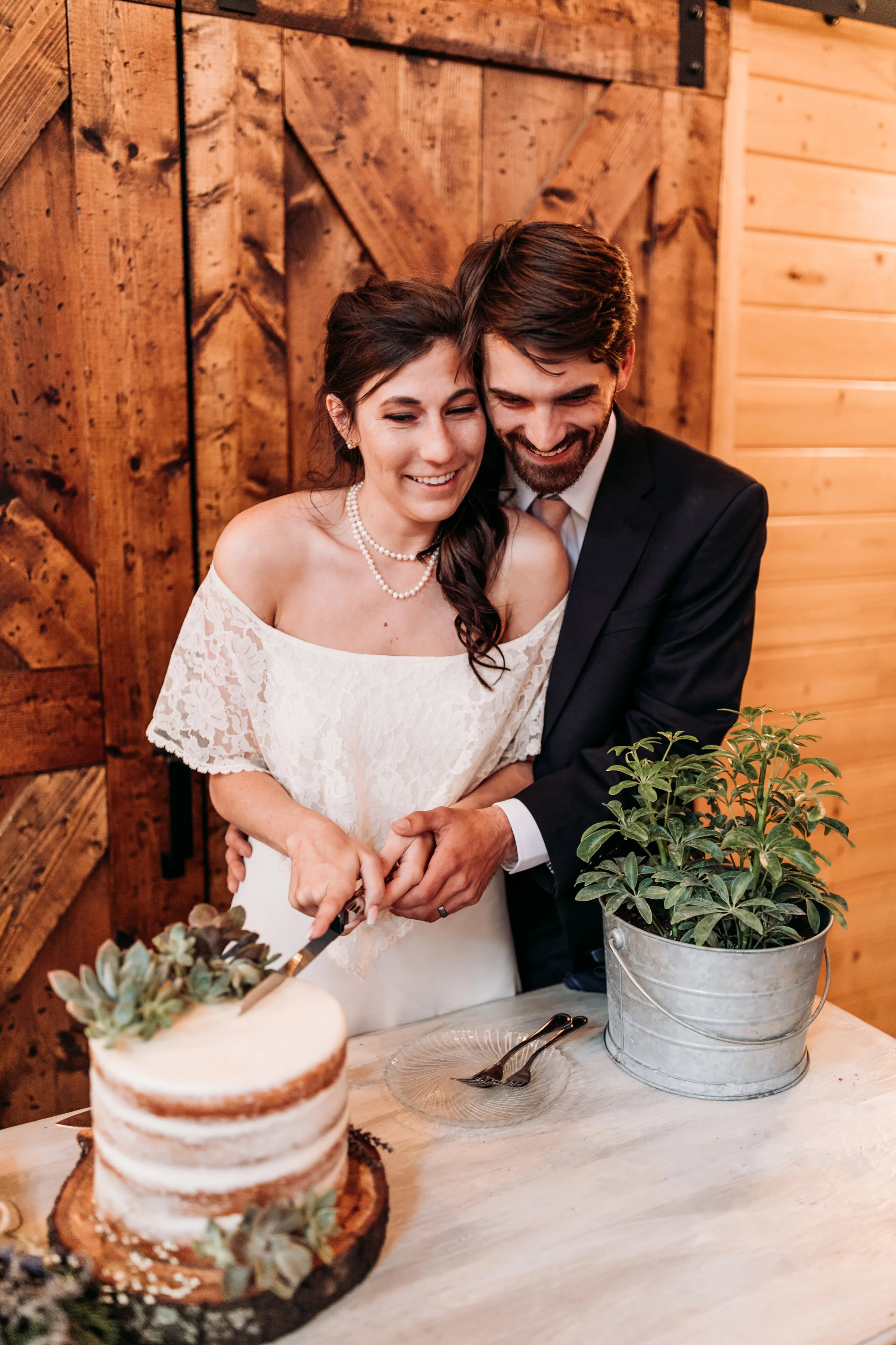 A naked cake topped with succulents. pc: Sydney Renee Photography