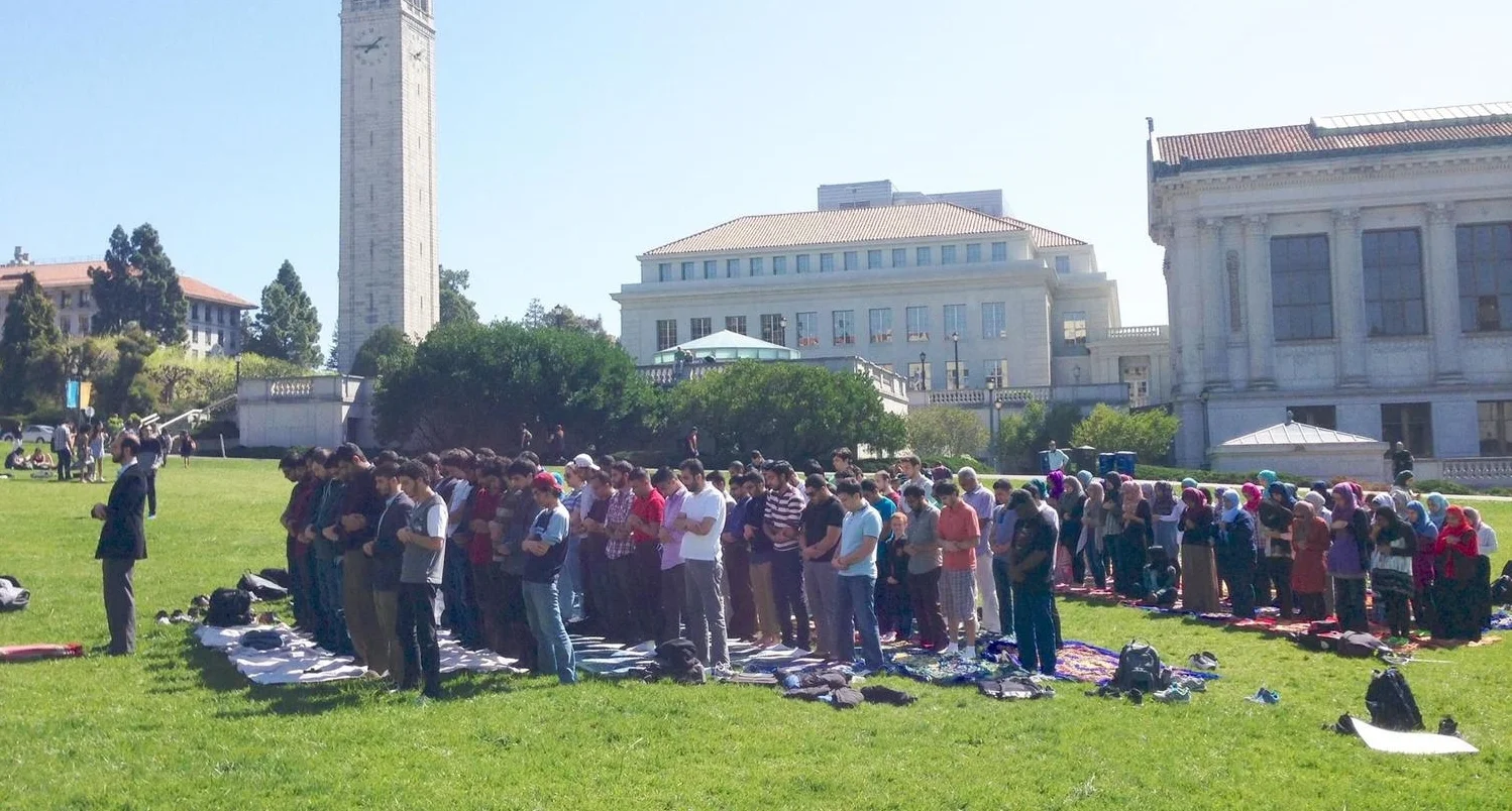 Students at the University of California-Berkeley pray Friday prayers on the university quad
