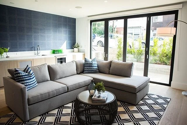 Fun little beach level rec room with full wet bar, big screen tv and indoor outdoor living with the big doors and walkout patio. #20128thstproject