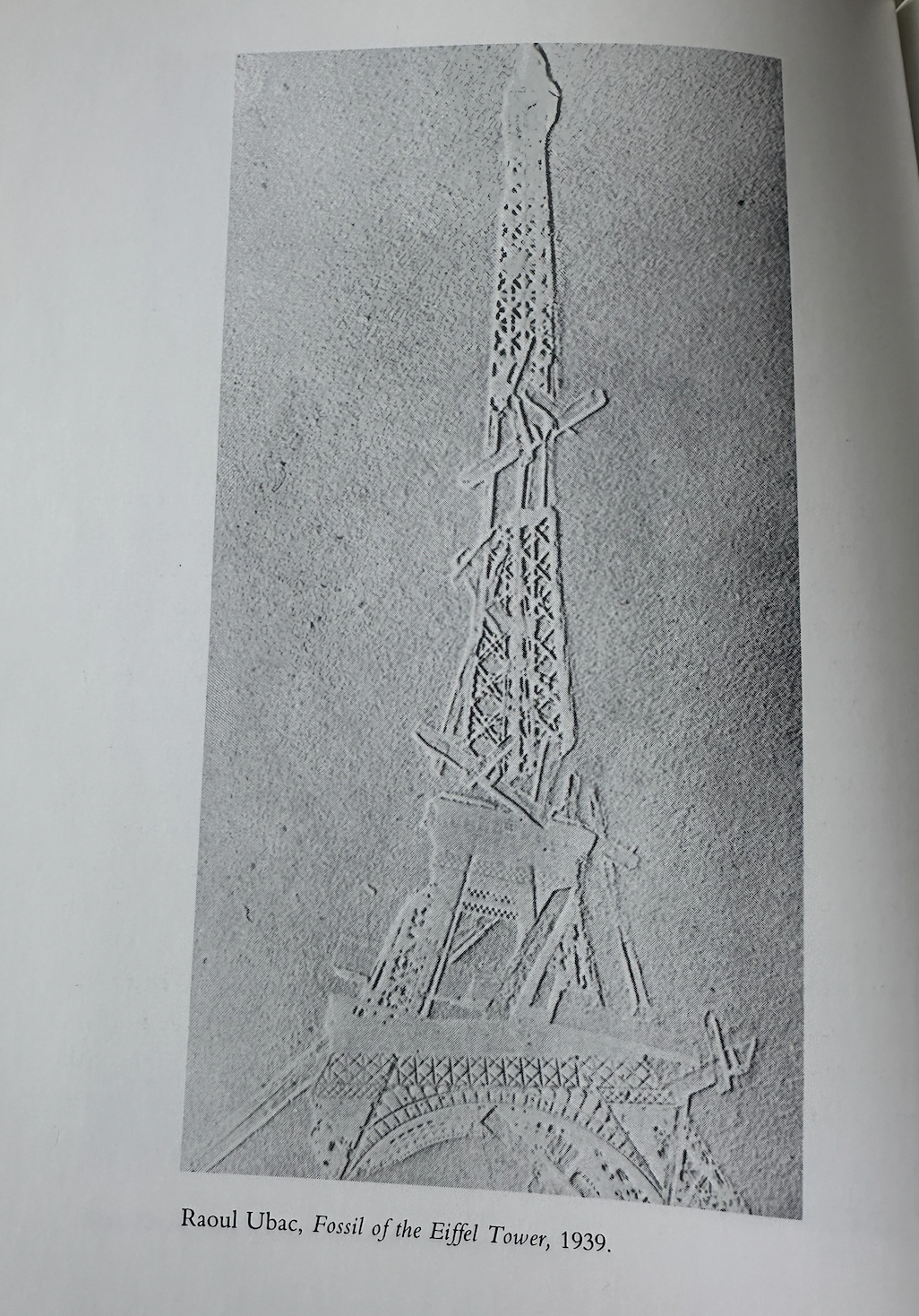 The ghosted green of the Eiffel fossil.