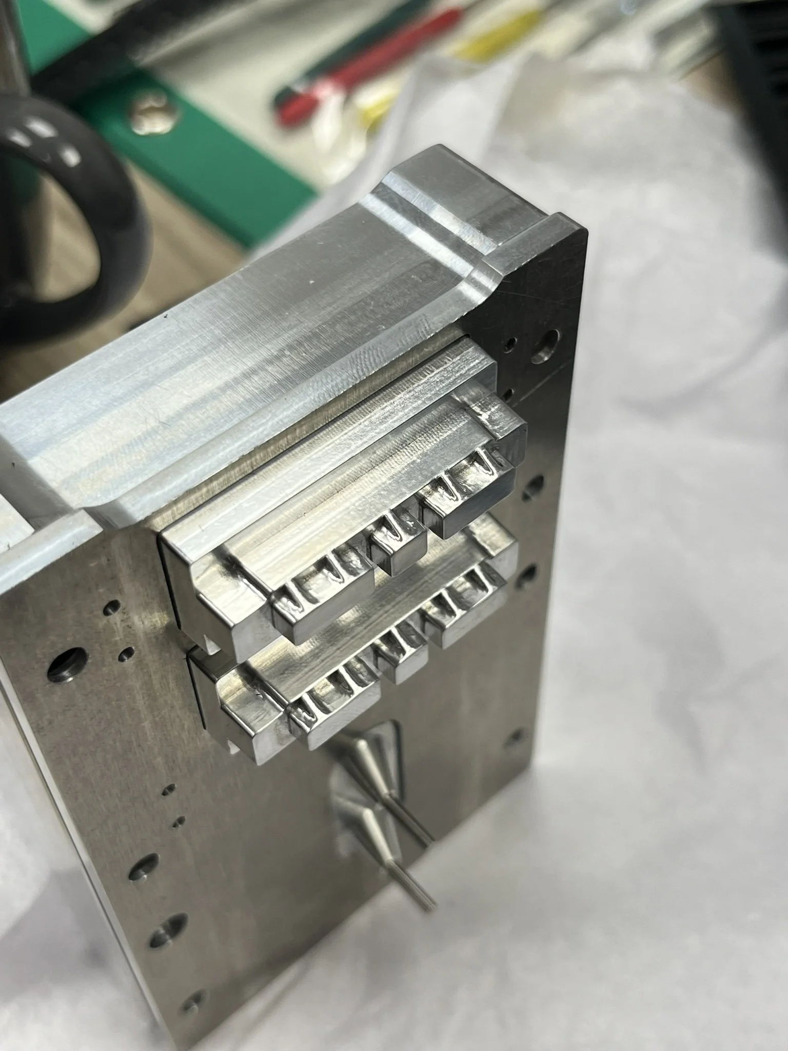 CNC-milled component with complex features requiring extended machining time to achieve the required accuracy and detail.