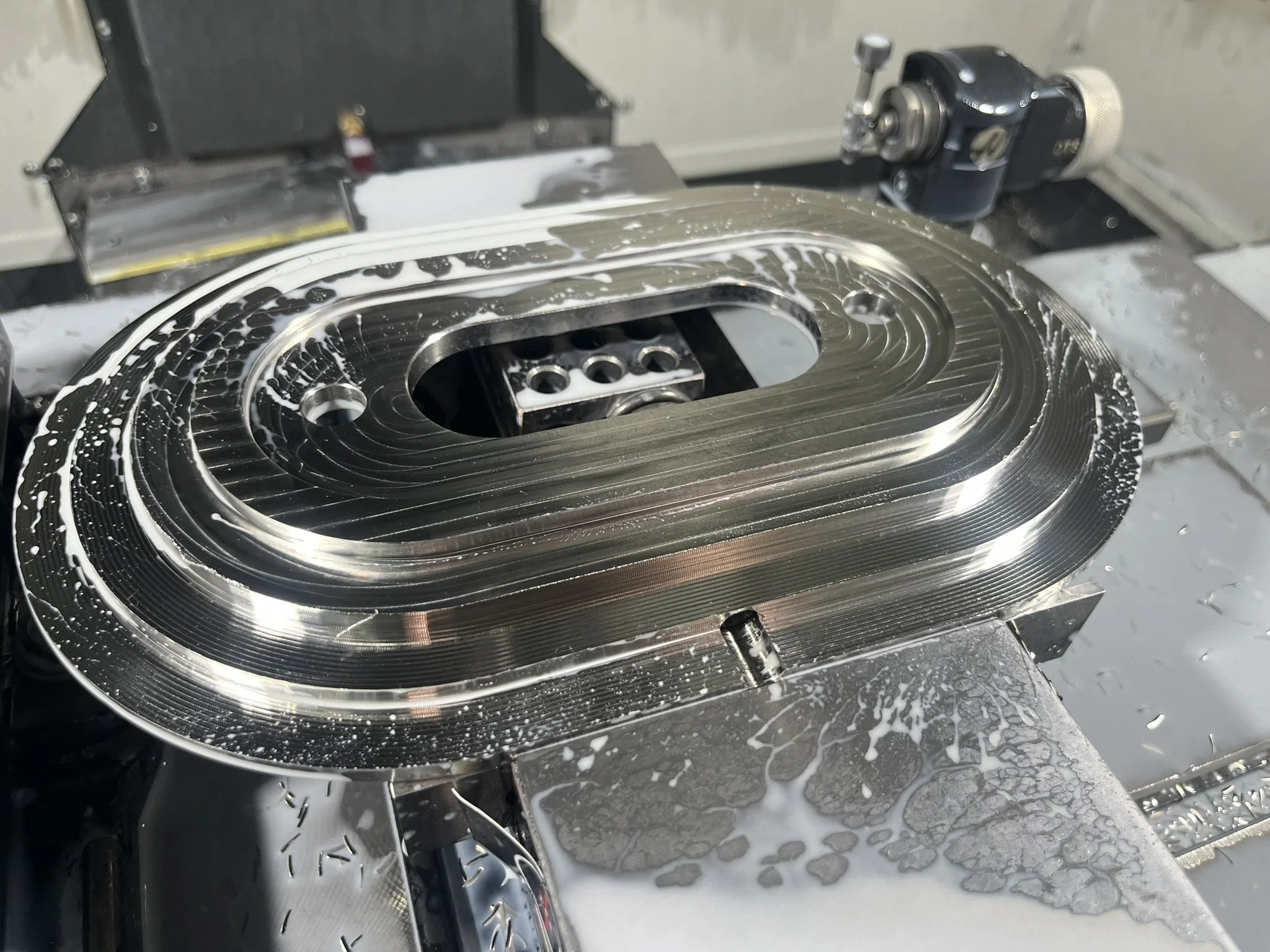 One-off custom prototype part being machined in-house on a CNC machine