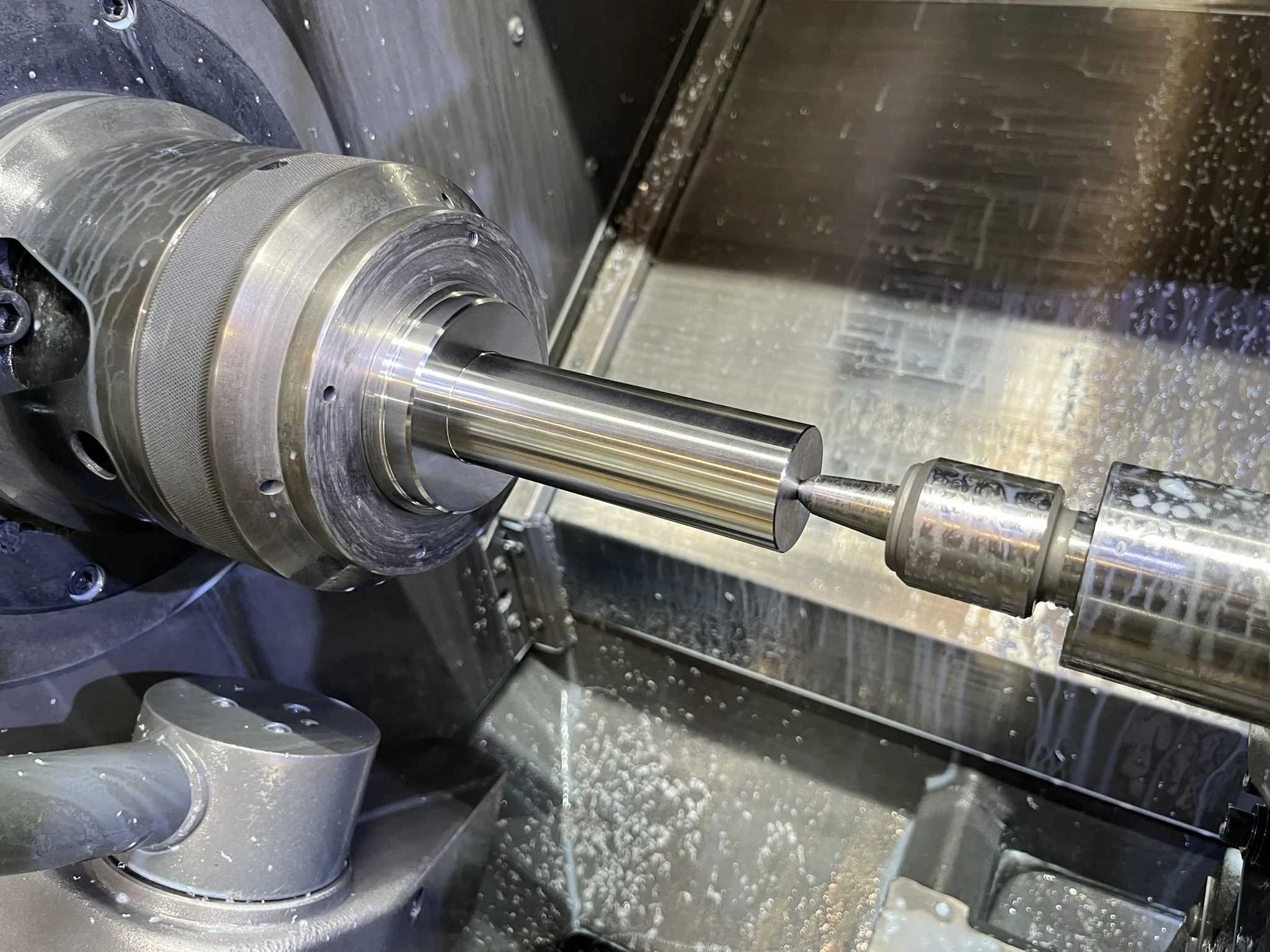 Large-diameter aluminium component machined on CNC lathe for hardware prototype.