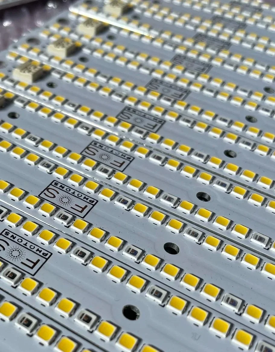 Array of custom LED modules mounted on carrier boards for prototype lighting assembly.