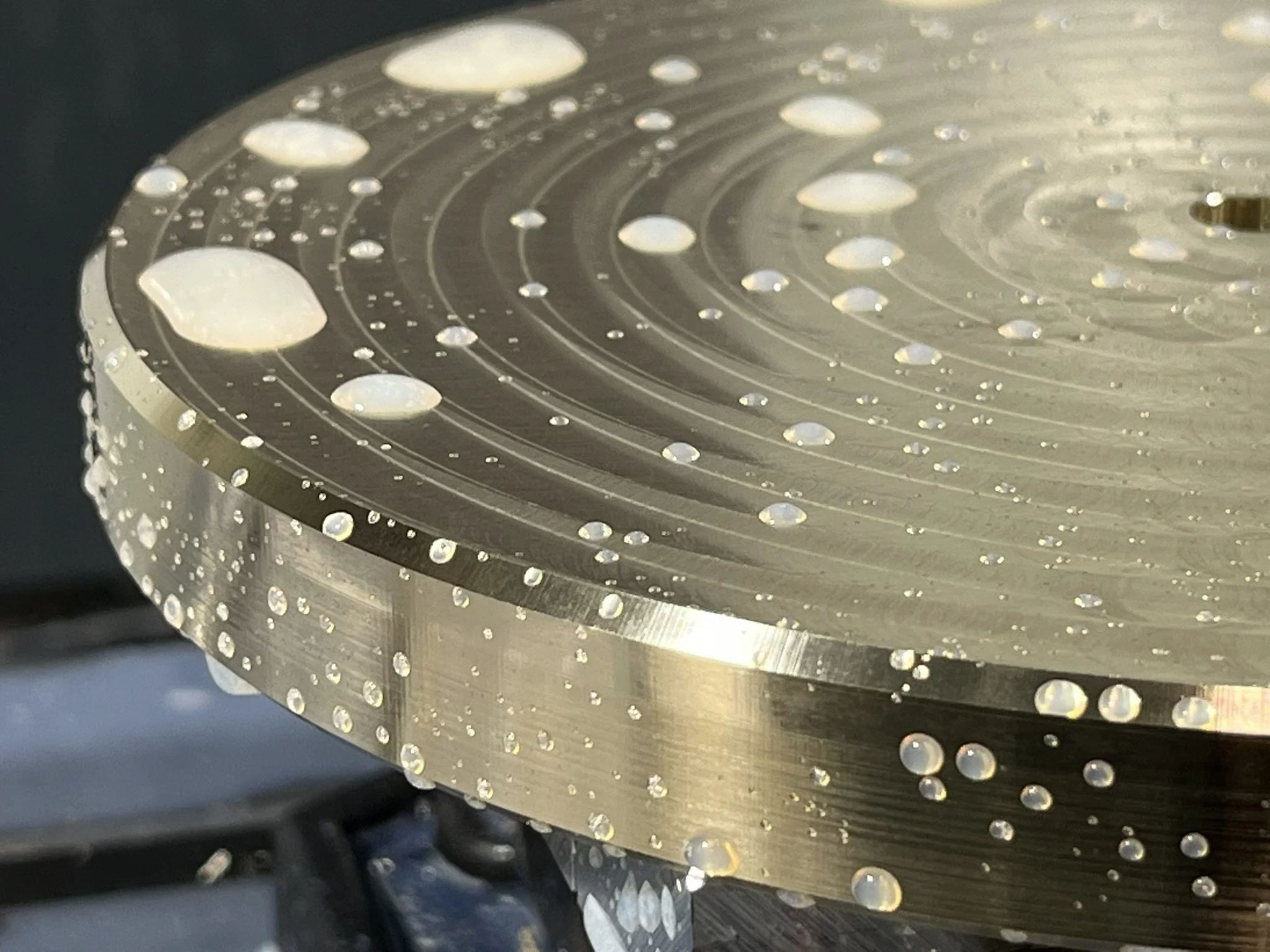 Brass component being CNC milled in a machining centre