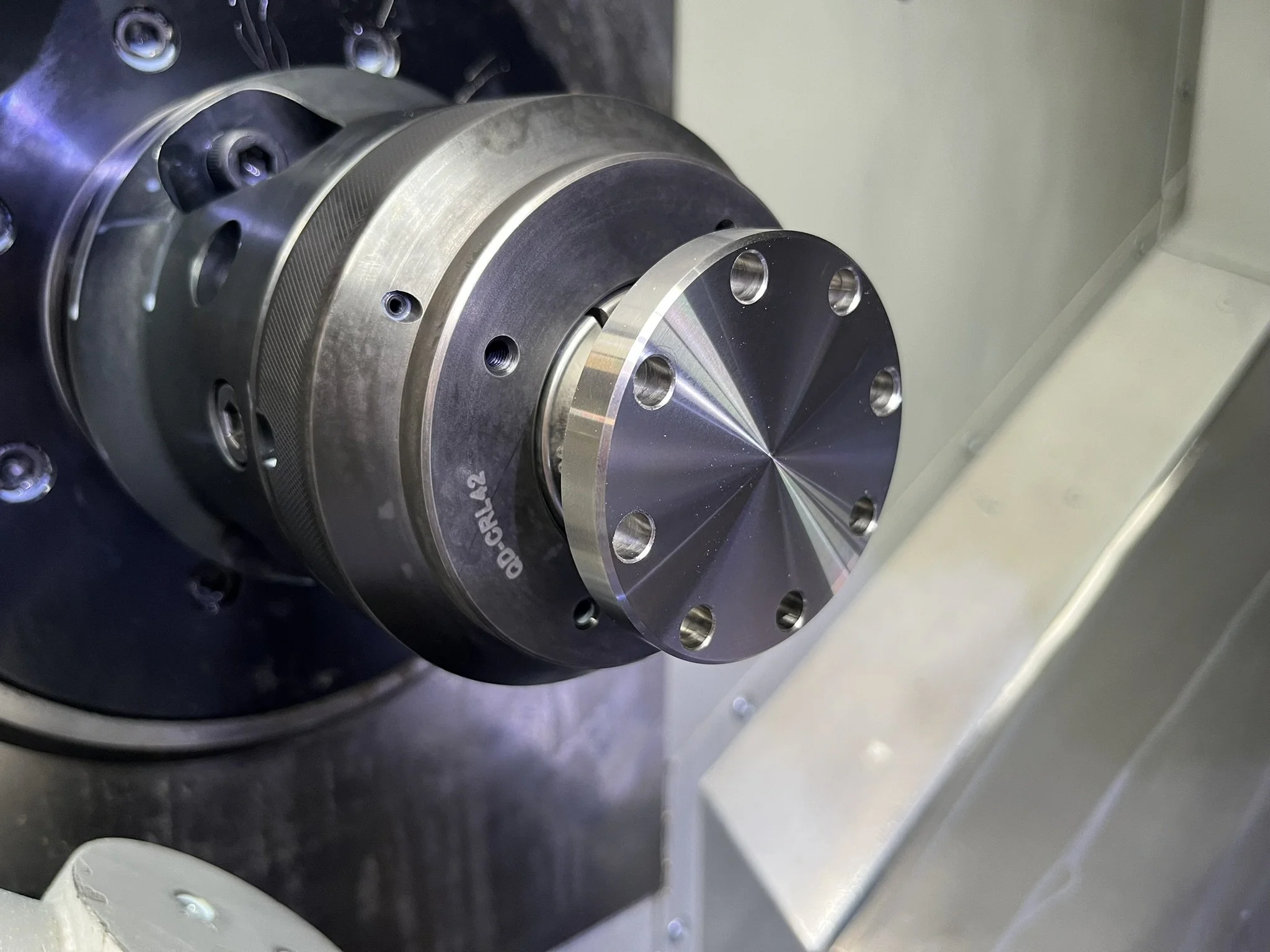 CNC turning stainless steel components in production