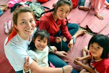 unificationist_gpa_felicia_bratti_with_thailand_kids.jpg