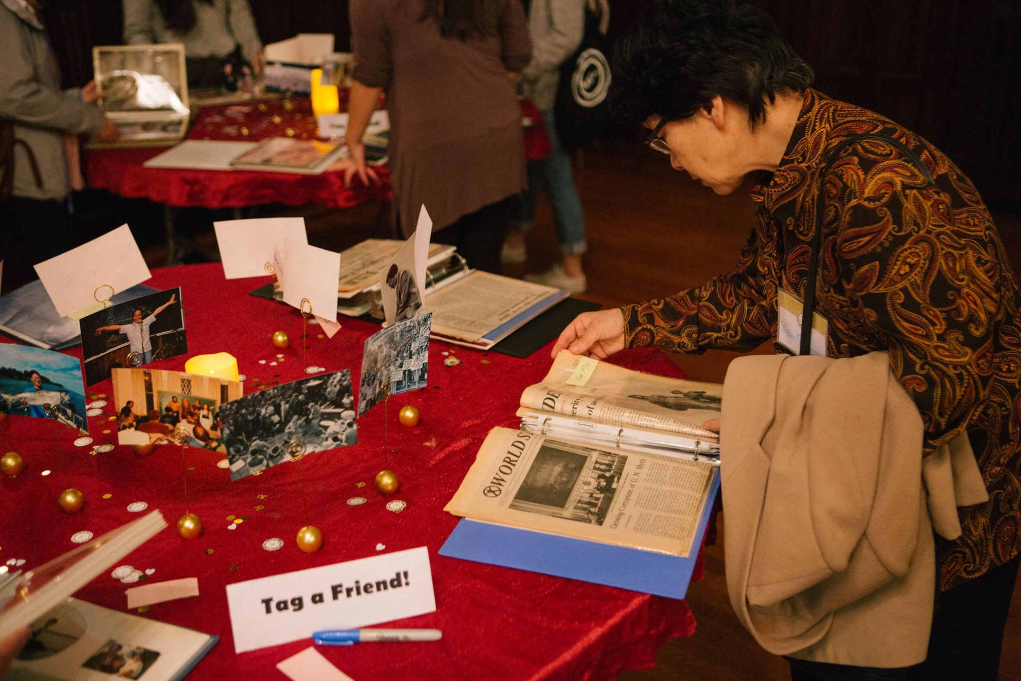 Reception of photos and literature celebrating CARP’s rich 50 years. 